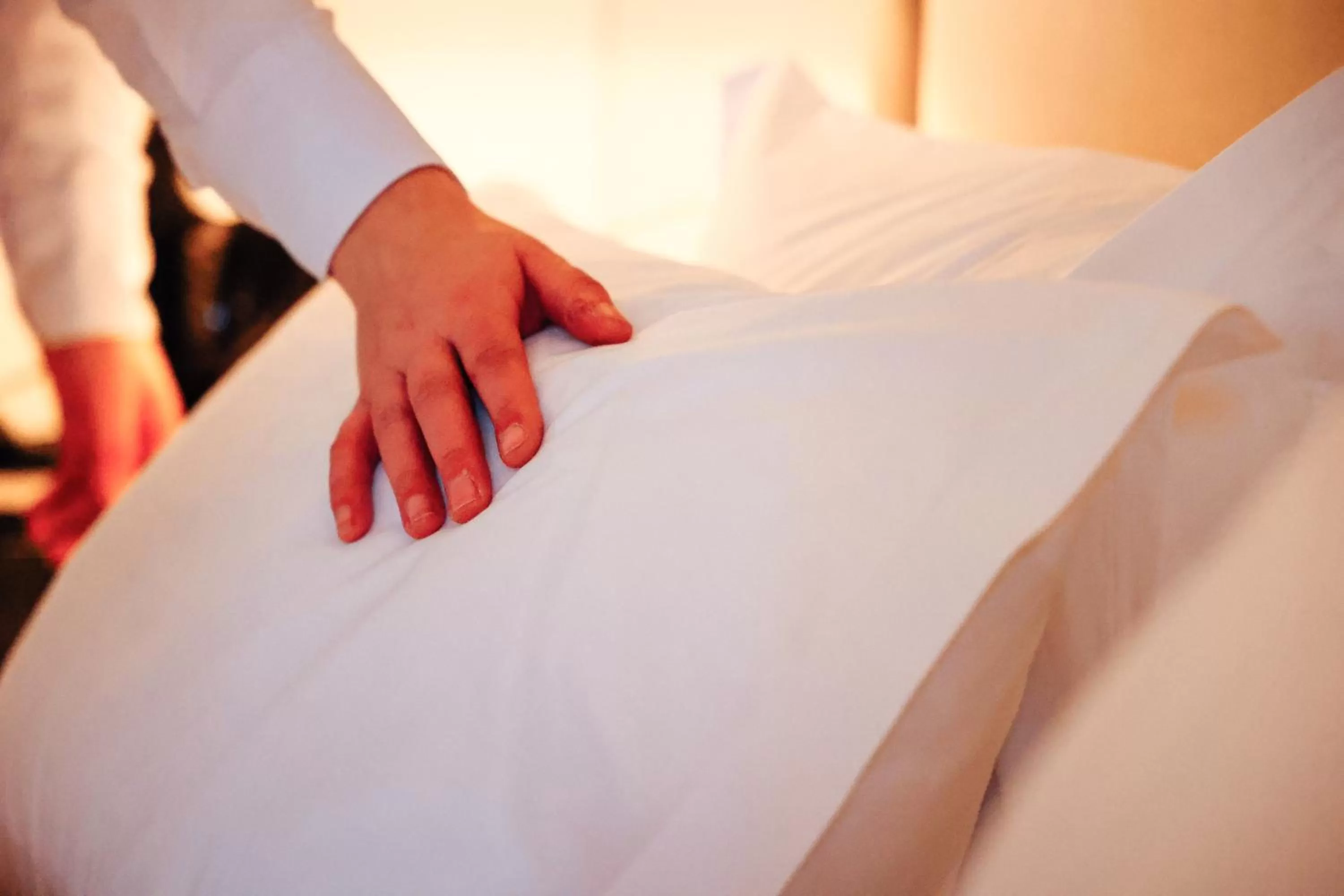 Bed in Senator Hotel