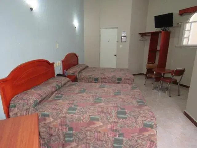 Bed in Hotel San Juan Centro