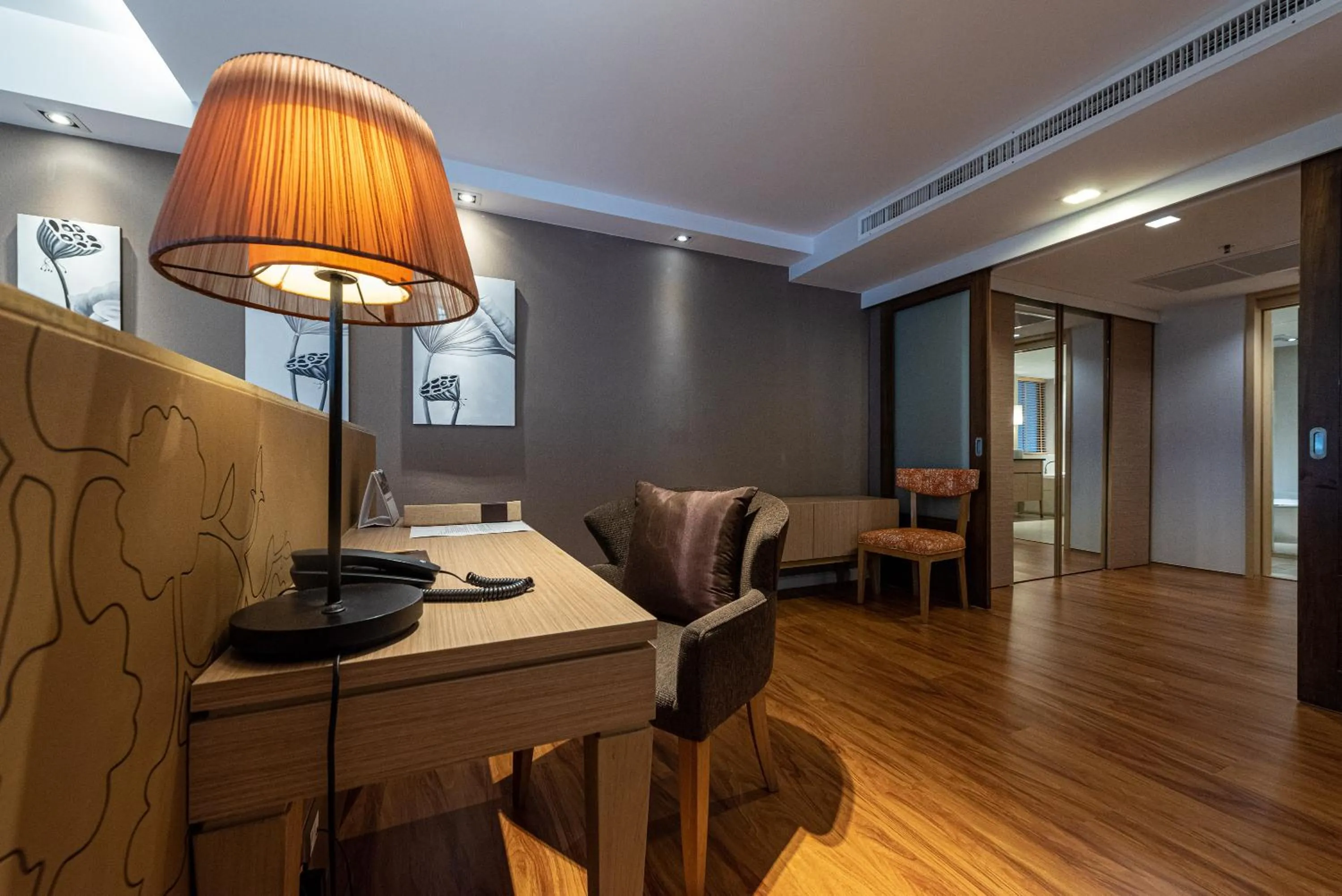 Living room in Summit Windmill Golf Suite Hotel at Suvarnabhumi