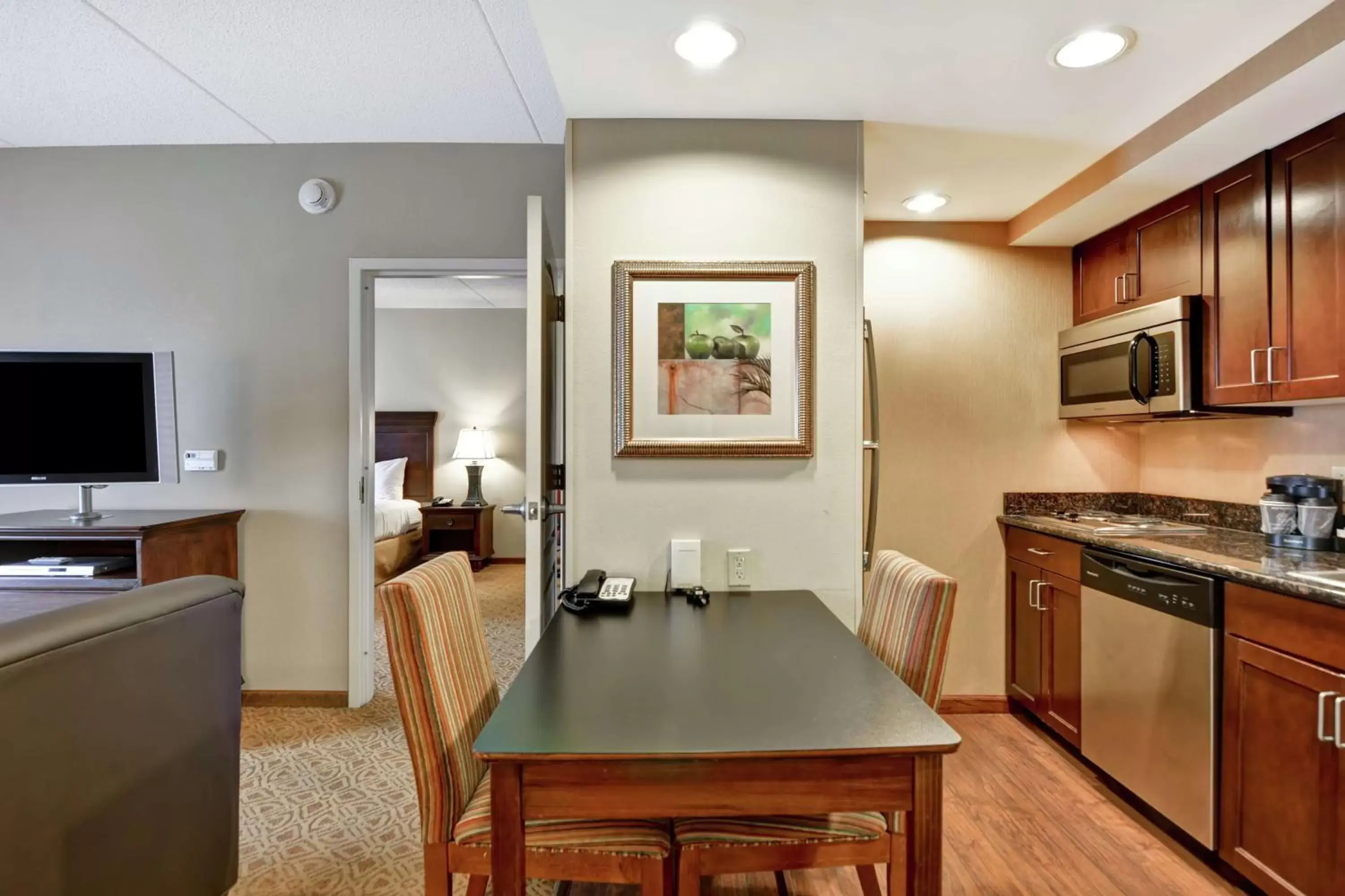 Bedroom, Kitchen/Kitchenette in Homewood Suites Fredericksburg