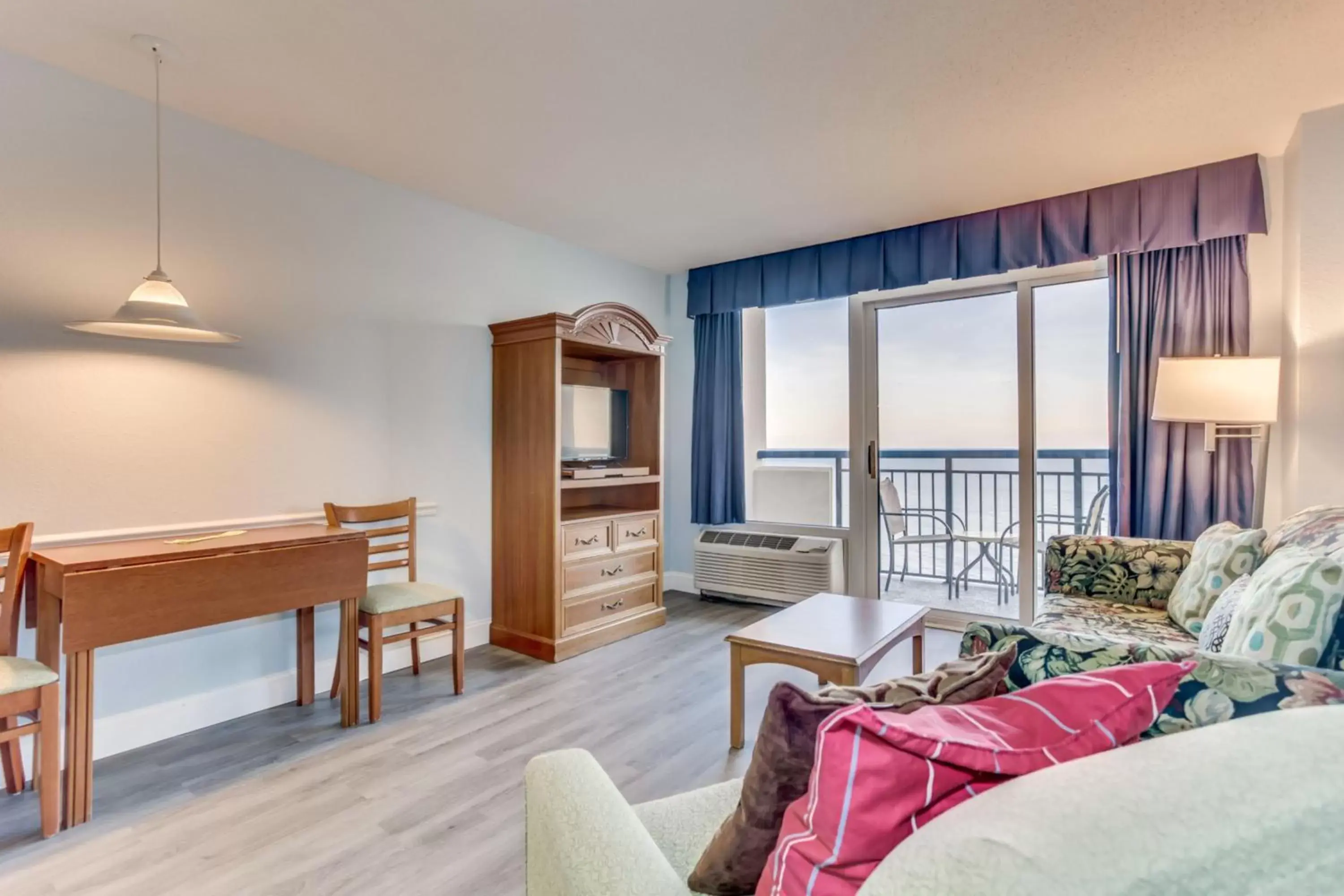 Living room, Seating Area in Boardwalk Beach Resort Condo w Oceanfront Balcony