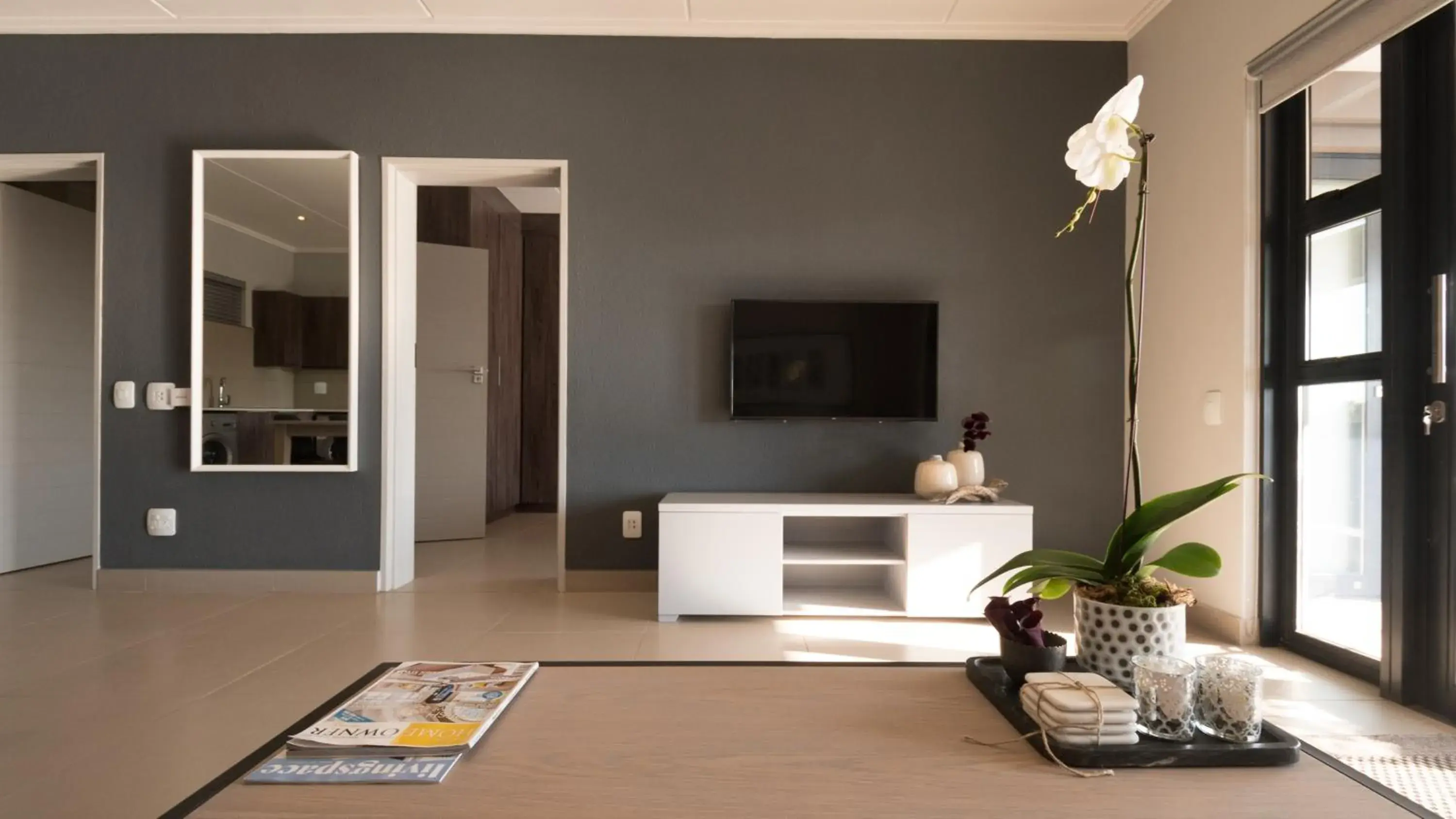 Living room in Odyssey Luxury Apartments - Back Up Generator Living room in Odyssey Luxury Apartments - Back Up Generator