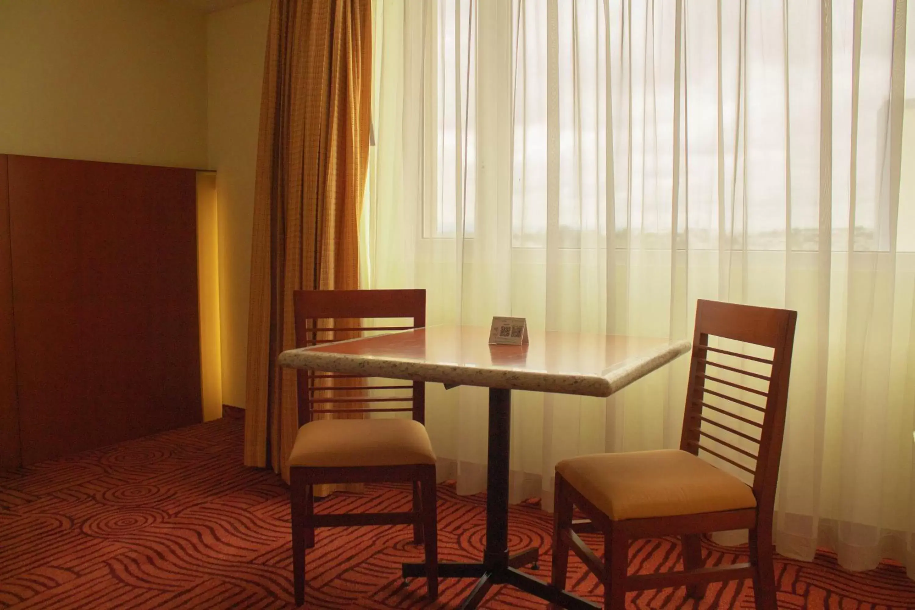 Photo of the whole room, Dining Area in Holiday Inn Puebla Finsa, an IHG Hotel