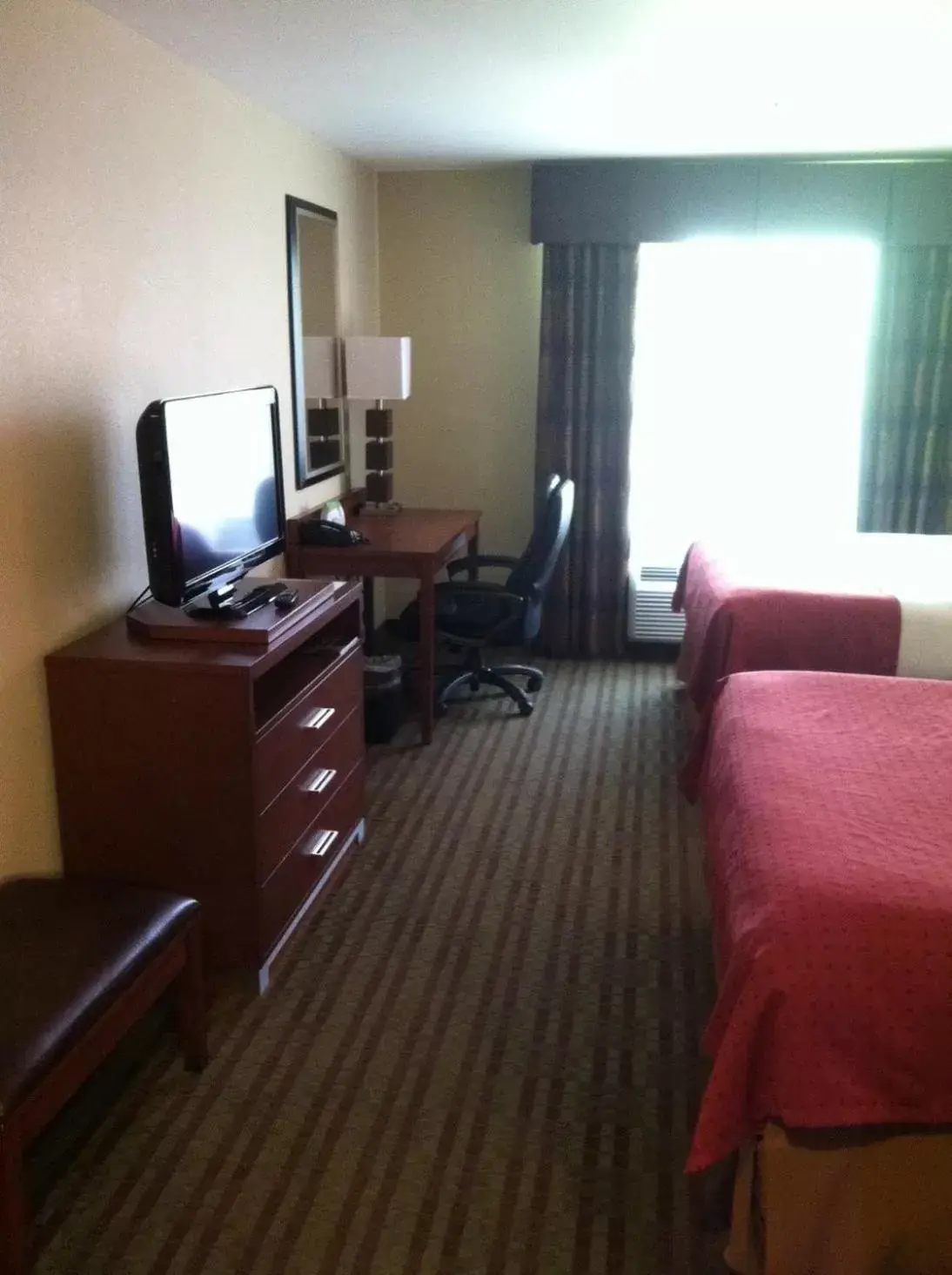Photo of the whole room, TV/Entertainment Center in Holiday Inn Austin North, an IHG Hotel