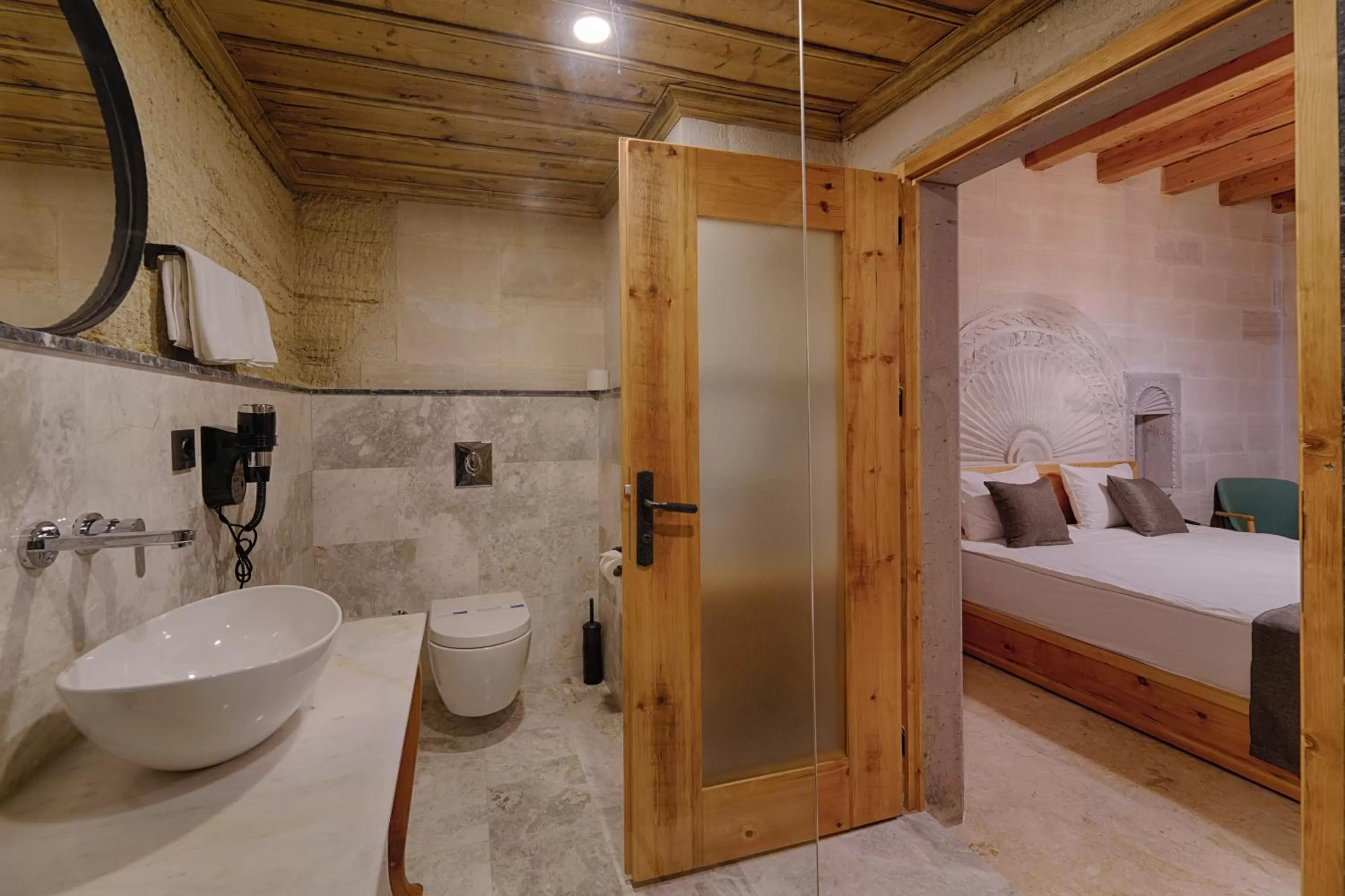 Bathroom, Bed in Concept Cave House