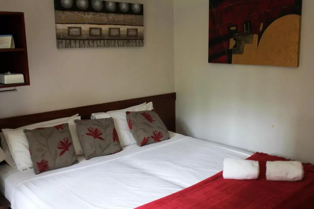 Bed in Bohemia Resort Cairns