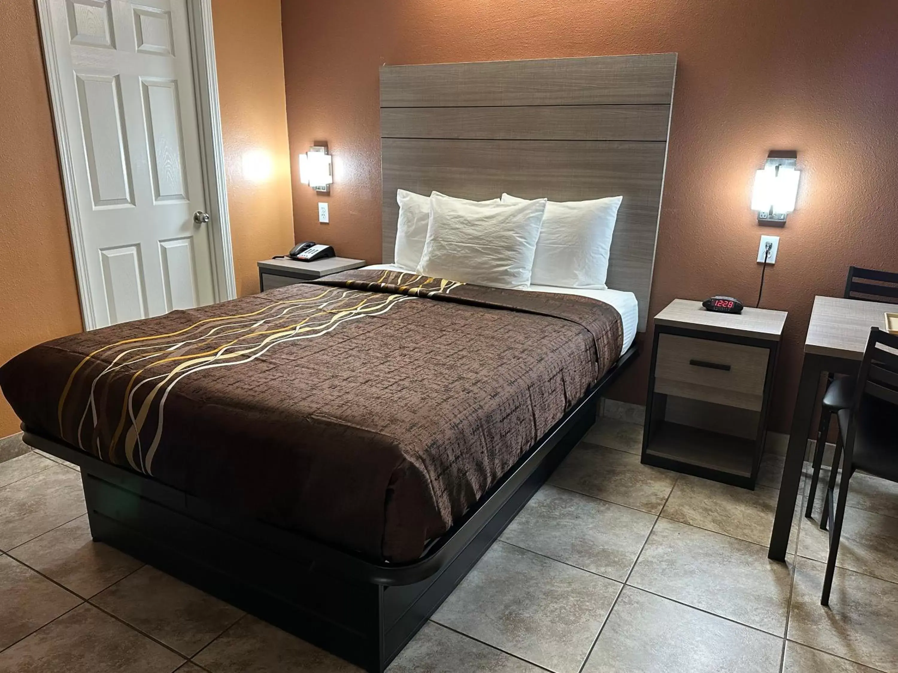 Bed in New Corral Motel