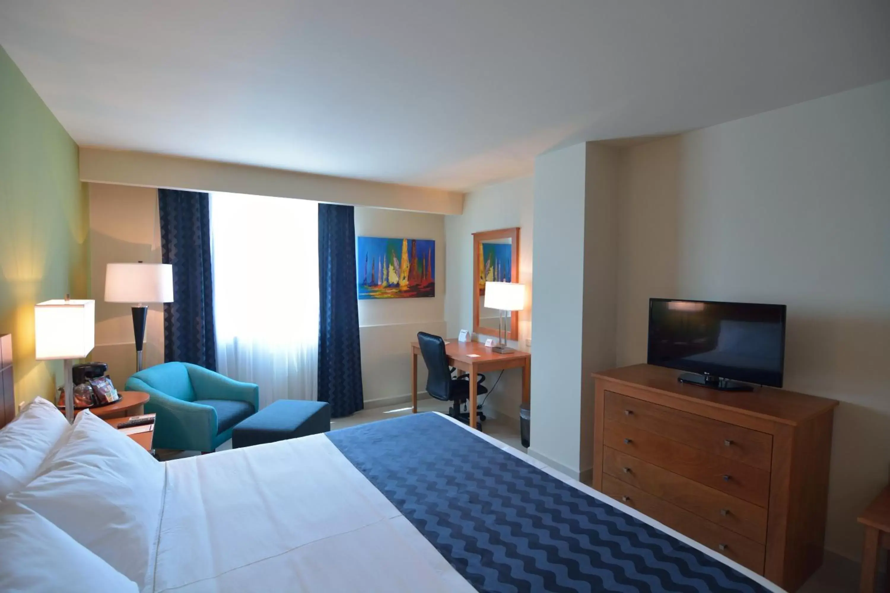 Photo of the whole room, TV/Entertainment Center in Holiday Inn Express Cabo San Lucas, an IHG Hotel