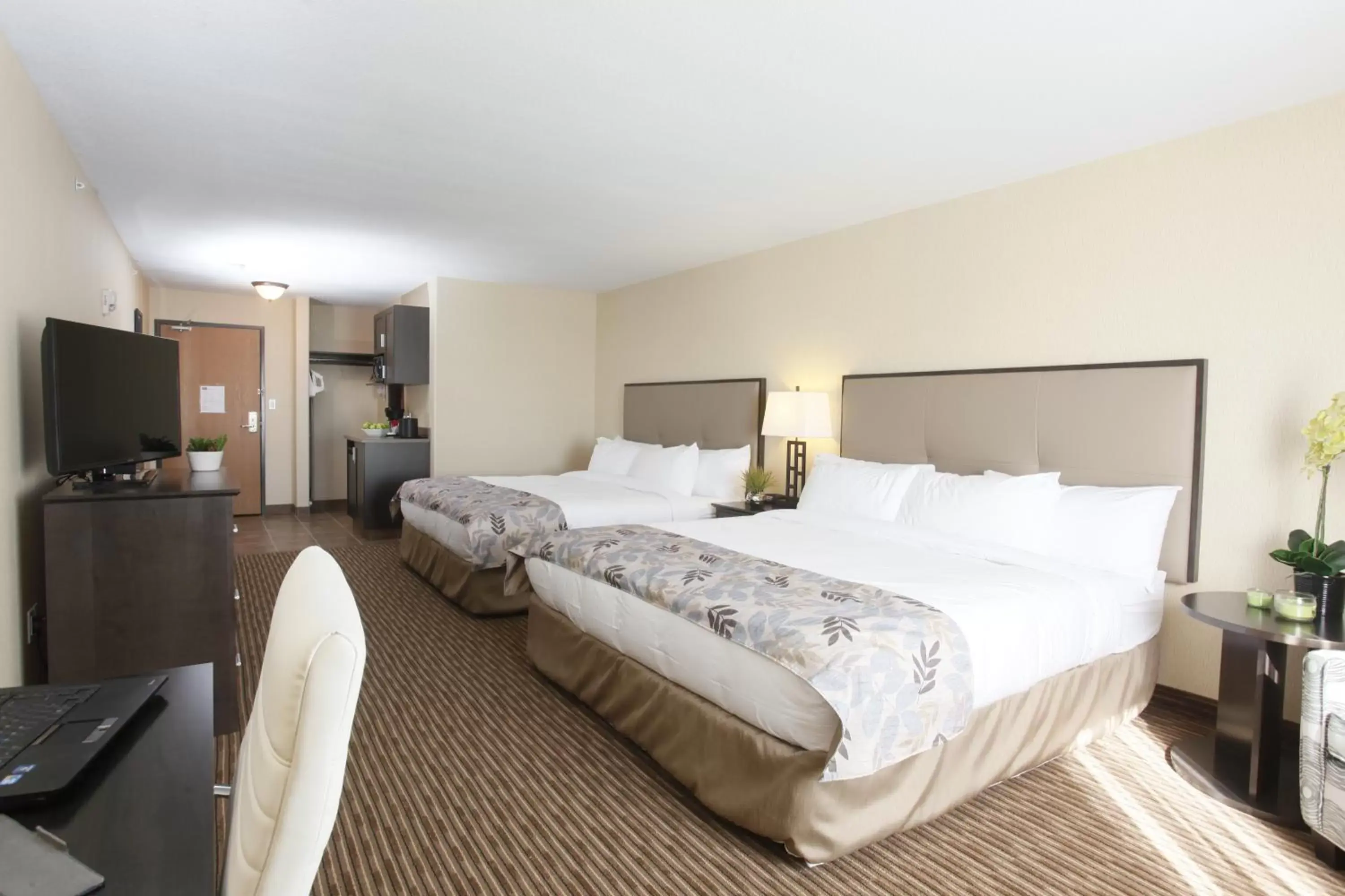 King Room with Two King Beds in Pomeroy Inn & Suites at Olds College King Room with Two King Beds in Pomeroy Inn & Suites at Olds College