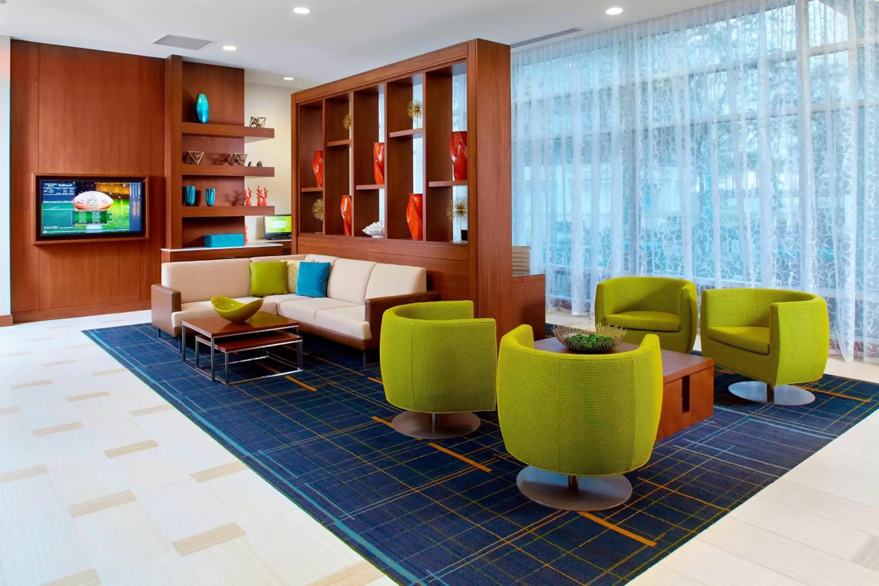 Lobby or reception, Lounge/Bar in Courtyard by Marriott Orlando Lake Nona
