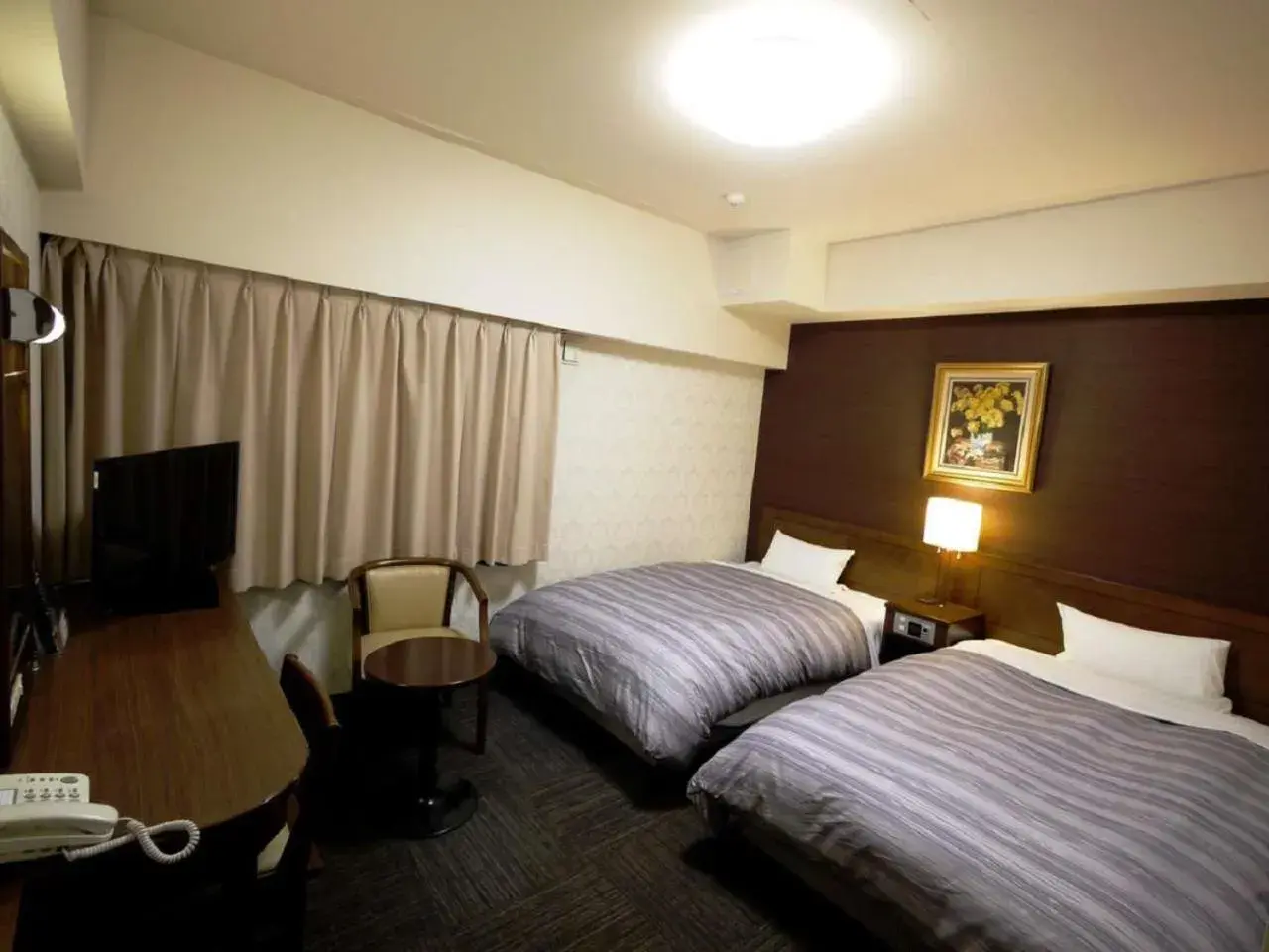 Bed in Hotel Route-Inn Yokohama Bashamichi