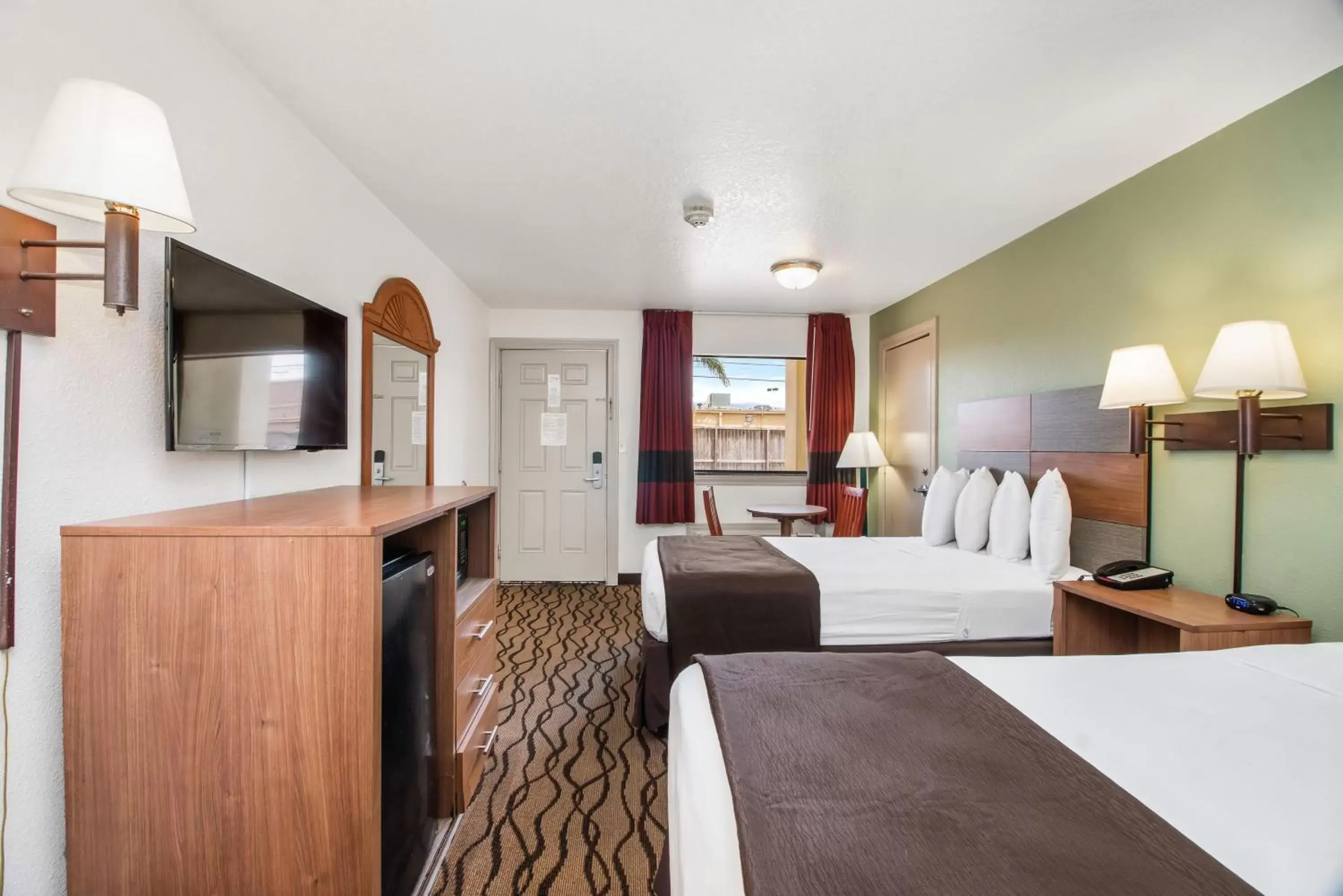 Bedroom in Beachcomber Inn by The Beach