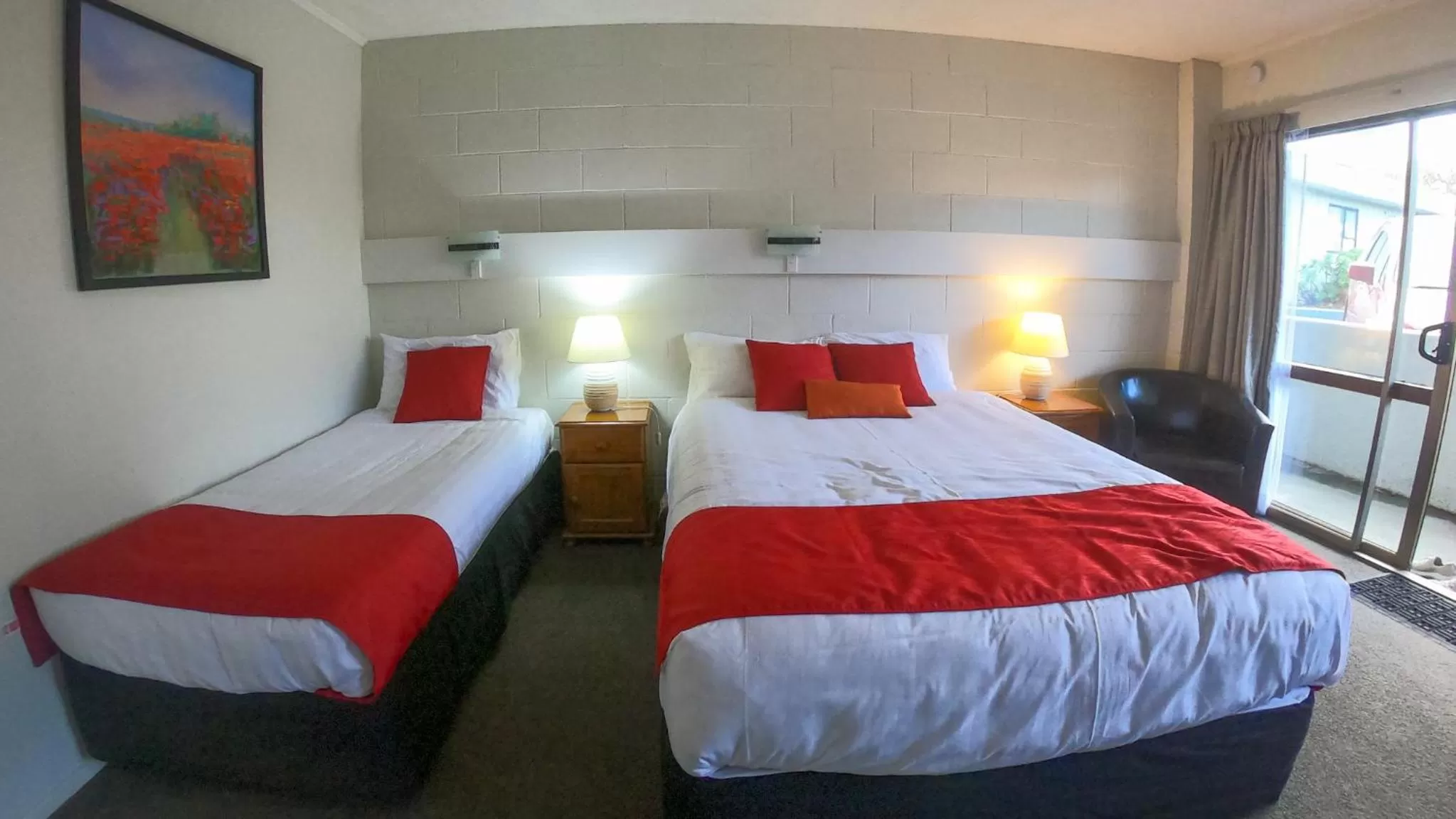 Bed in Fiesta Court Motel