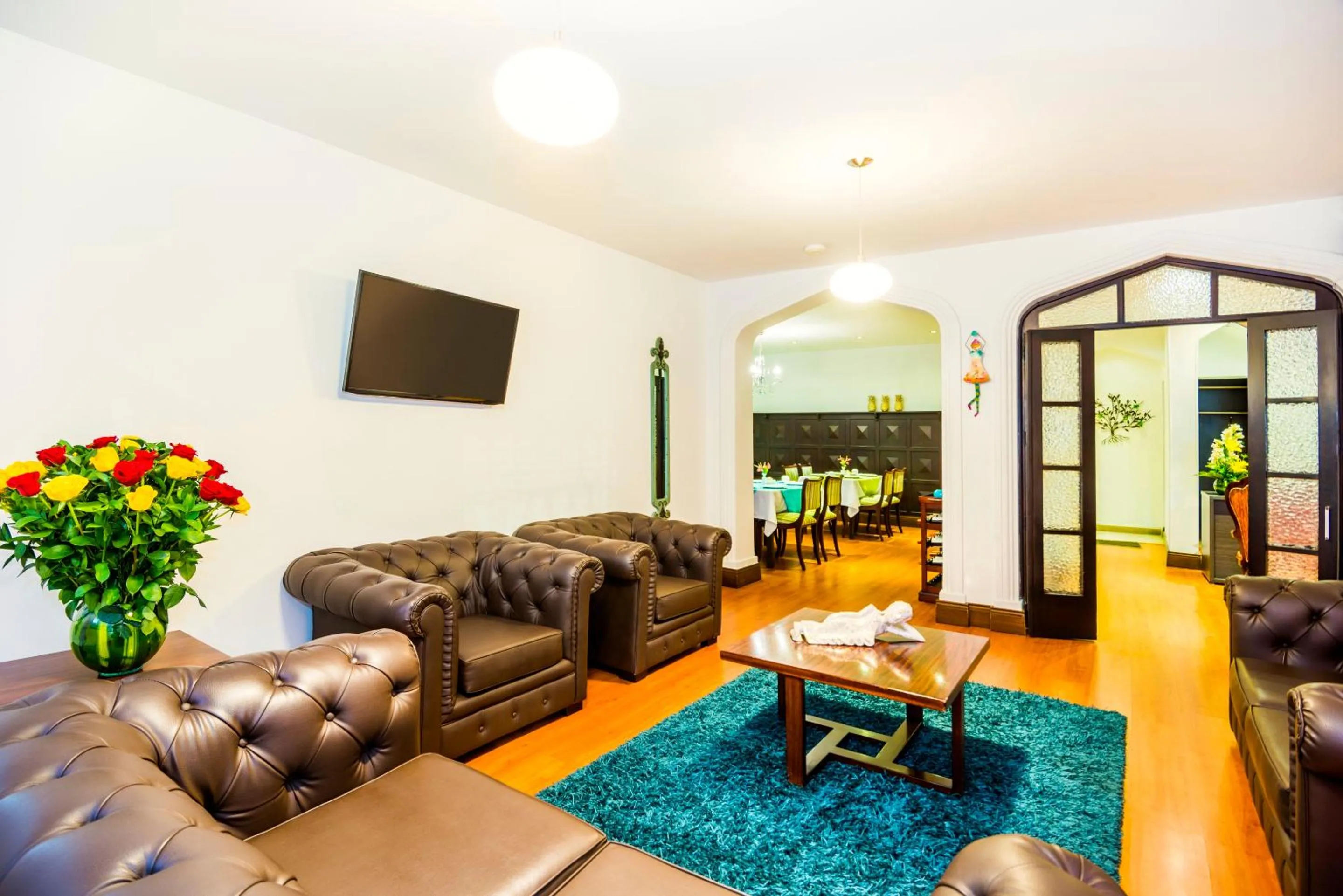 Communal lounge/ TV room in Matisse Hotel