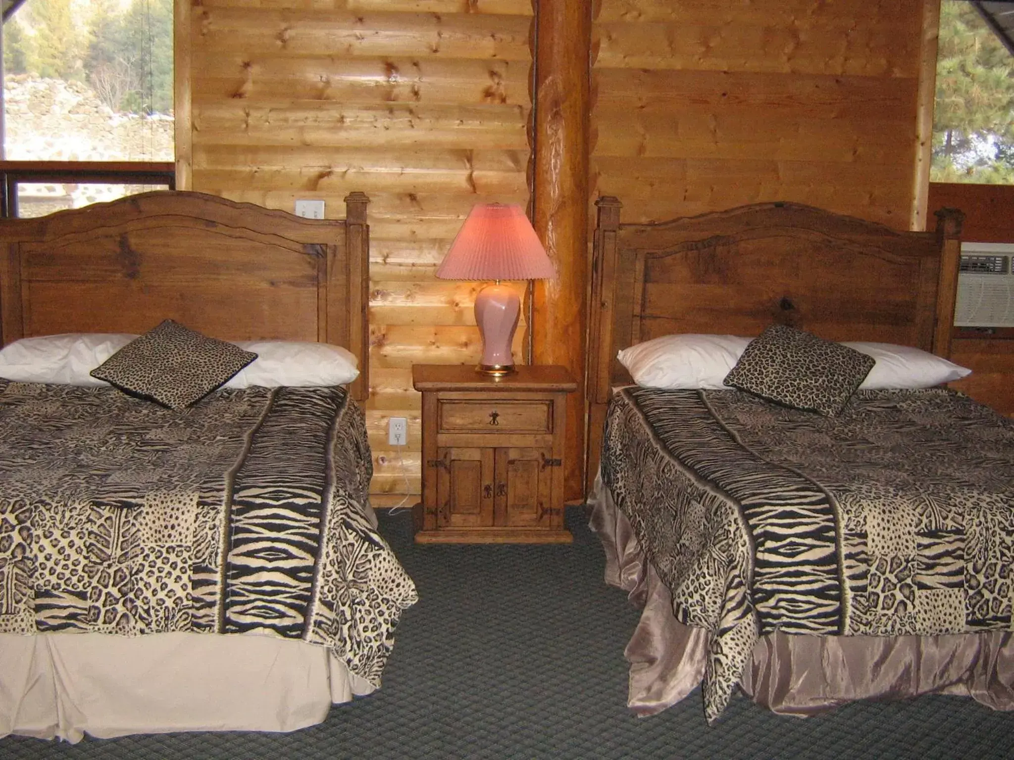 Bed in Rainbow Lake Castle Resort