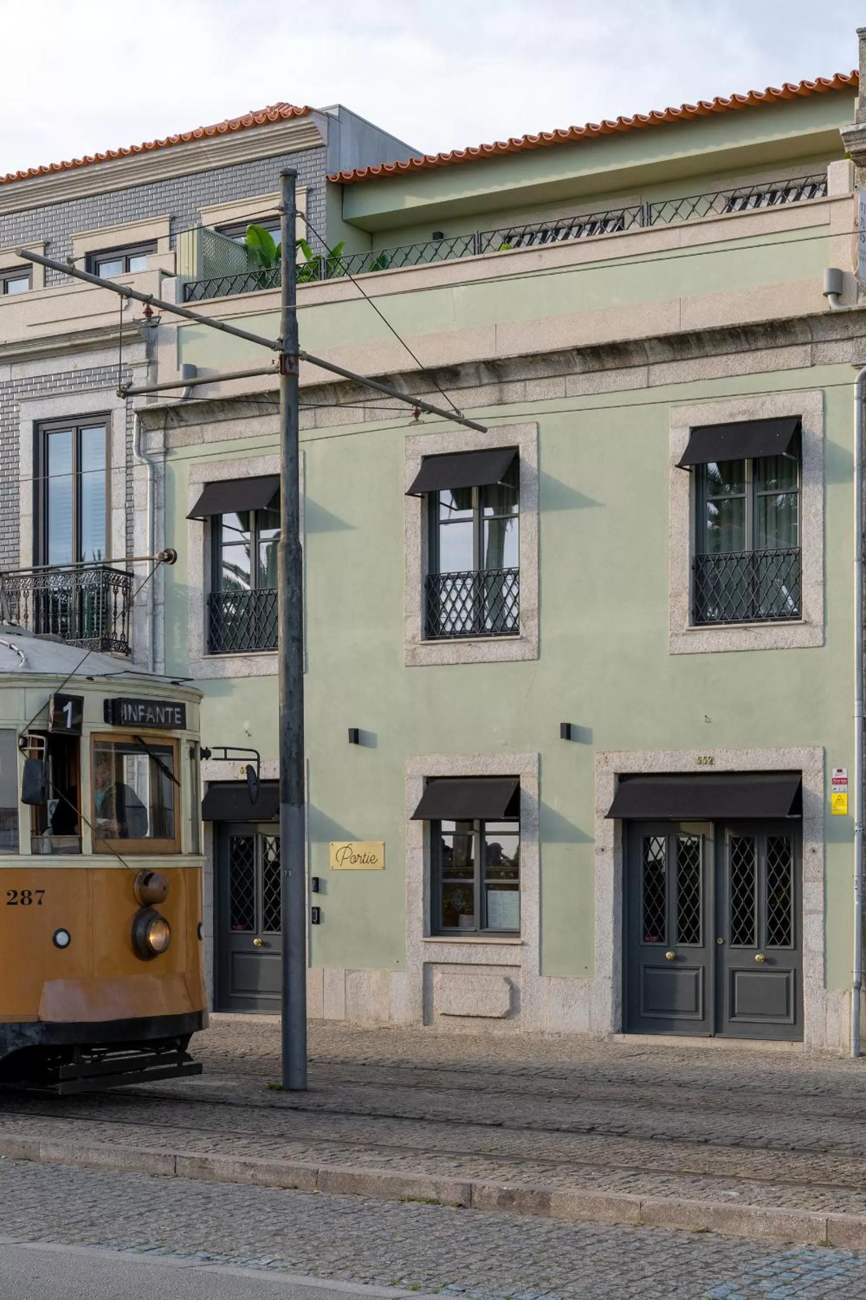 Property Building in Portie Deluxe Suites by DA'HOME