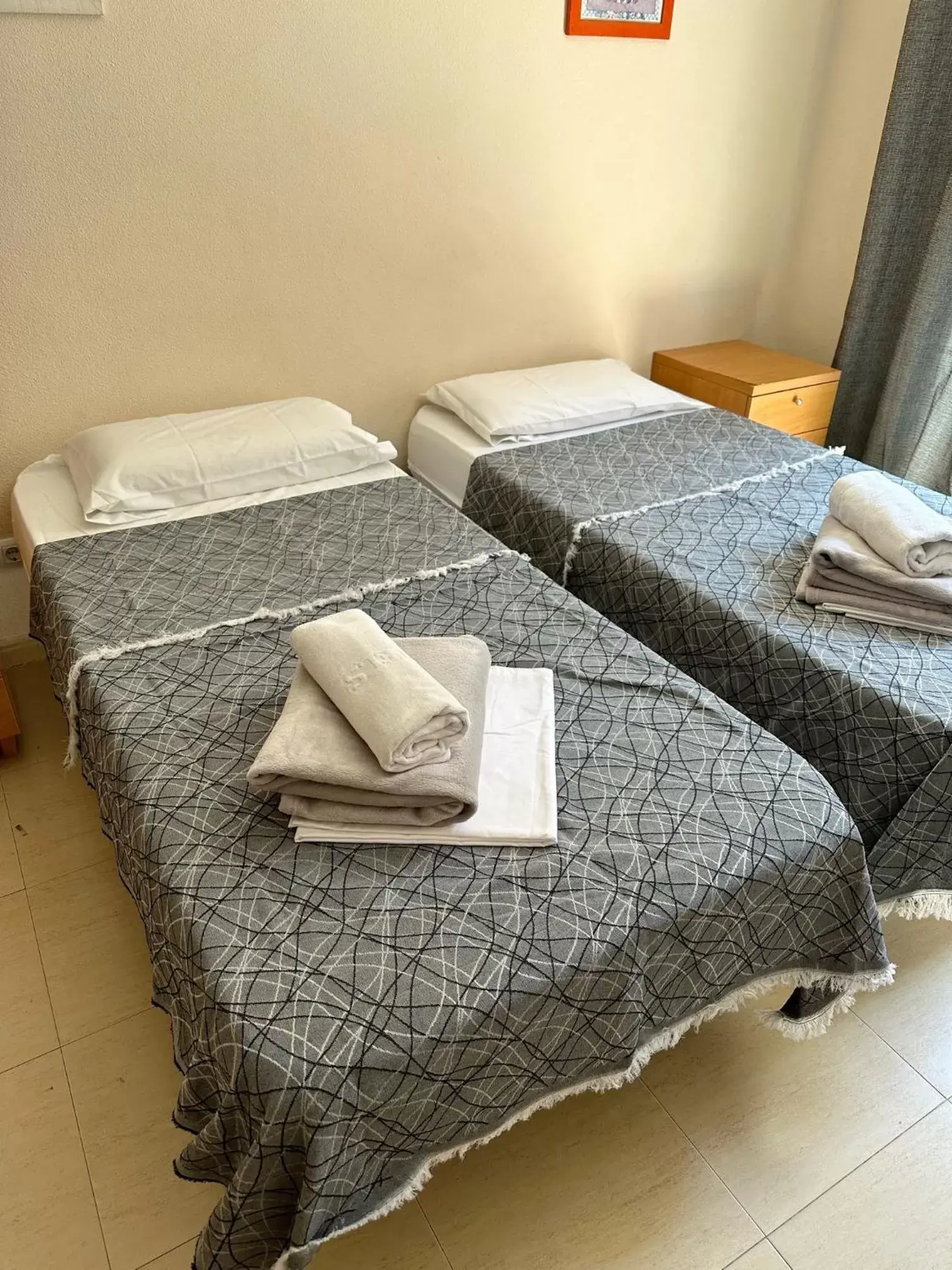 Bed in Royal Inn Aparthotel