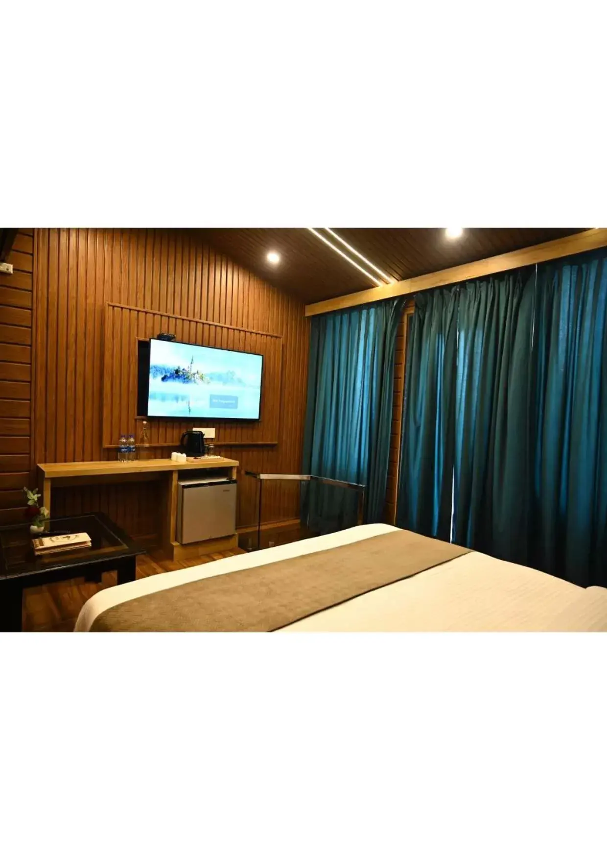 Bedroom, TV/Entertainment Center in Hotel Heritage Inn at Assi Ghat