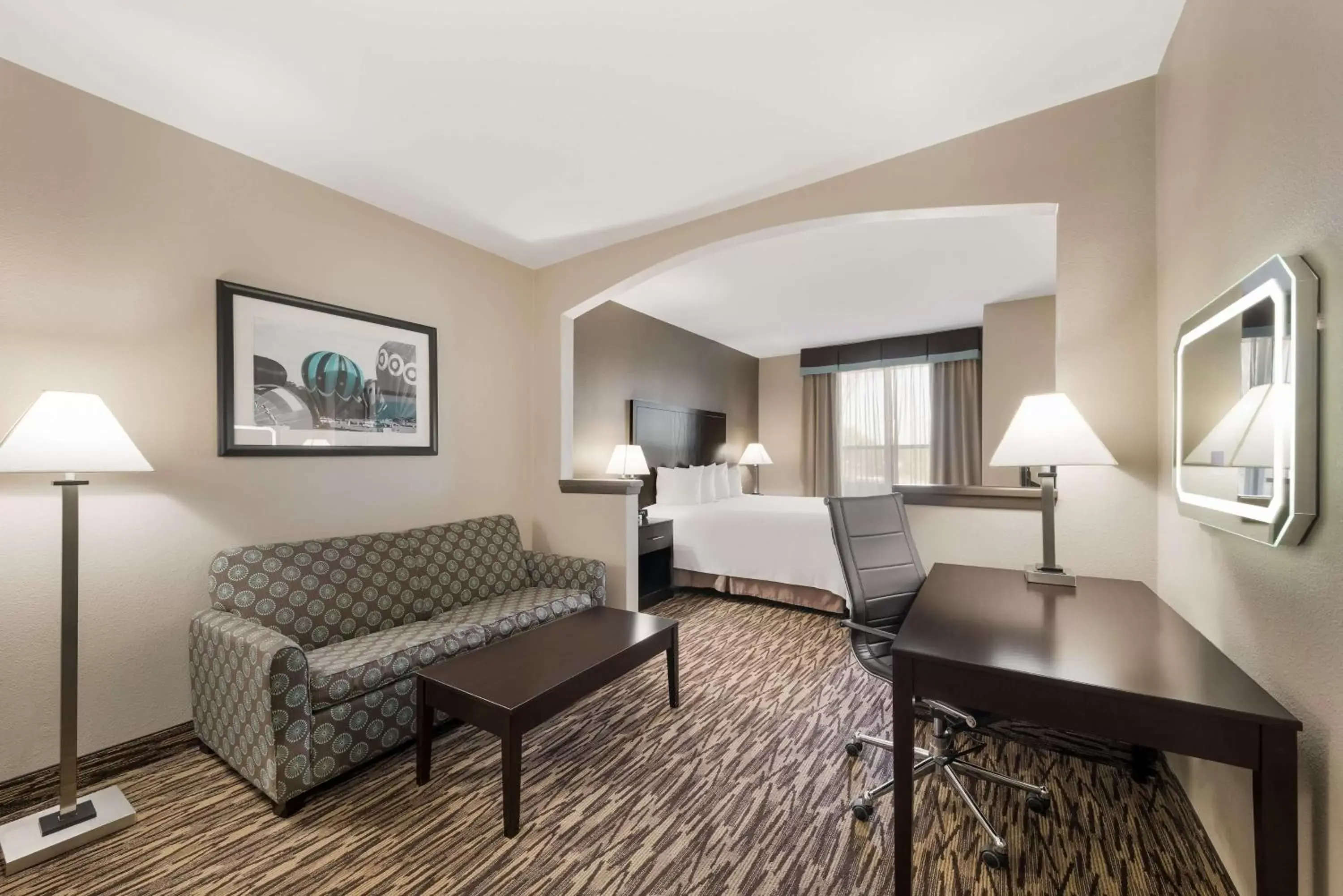 Bedroom, Seating Area in SureStay Plus Hotel by Best Western Plano