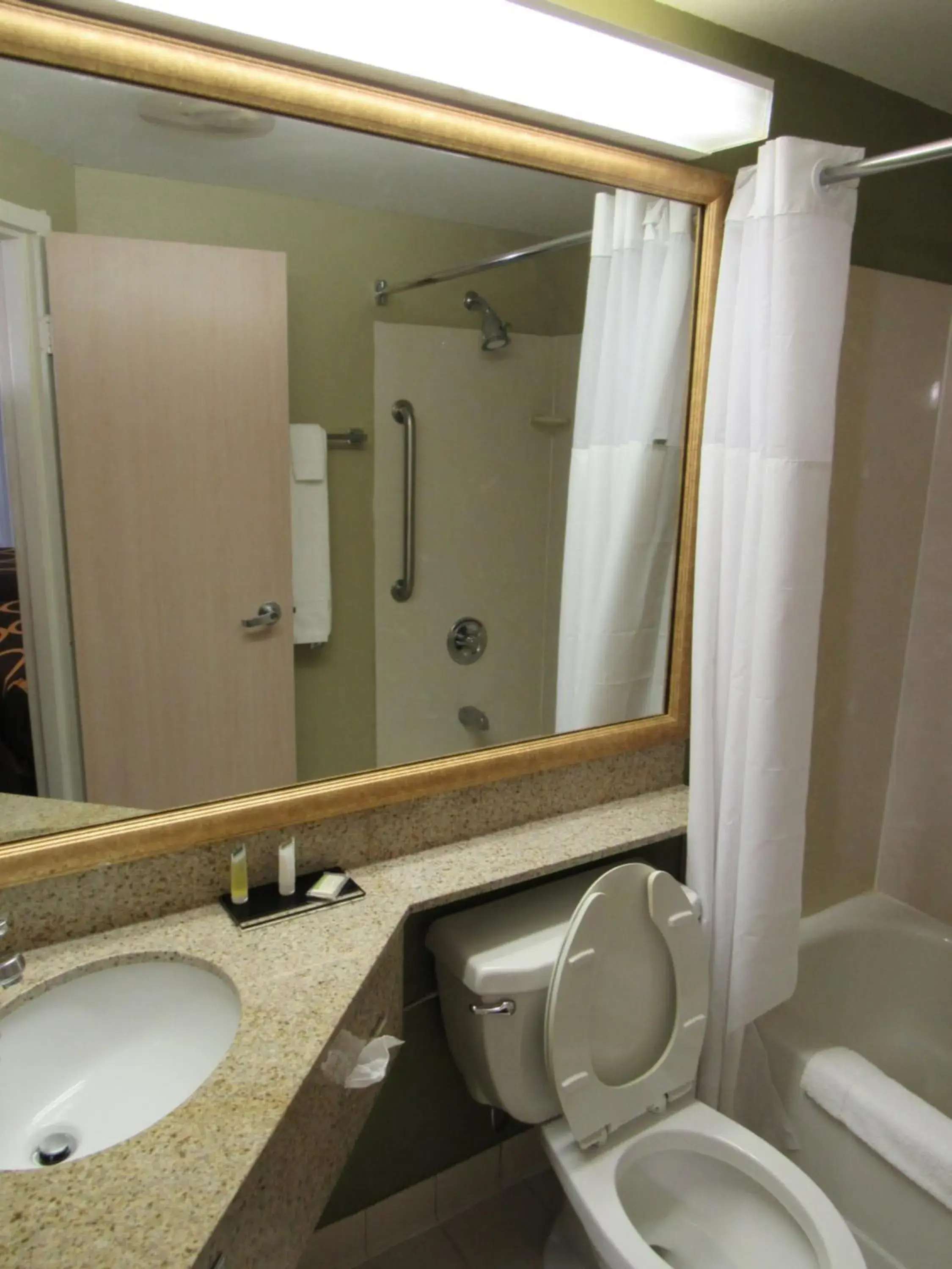 Bathroom in Super 8 by Wyndham New Cumberland