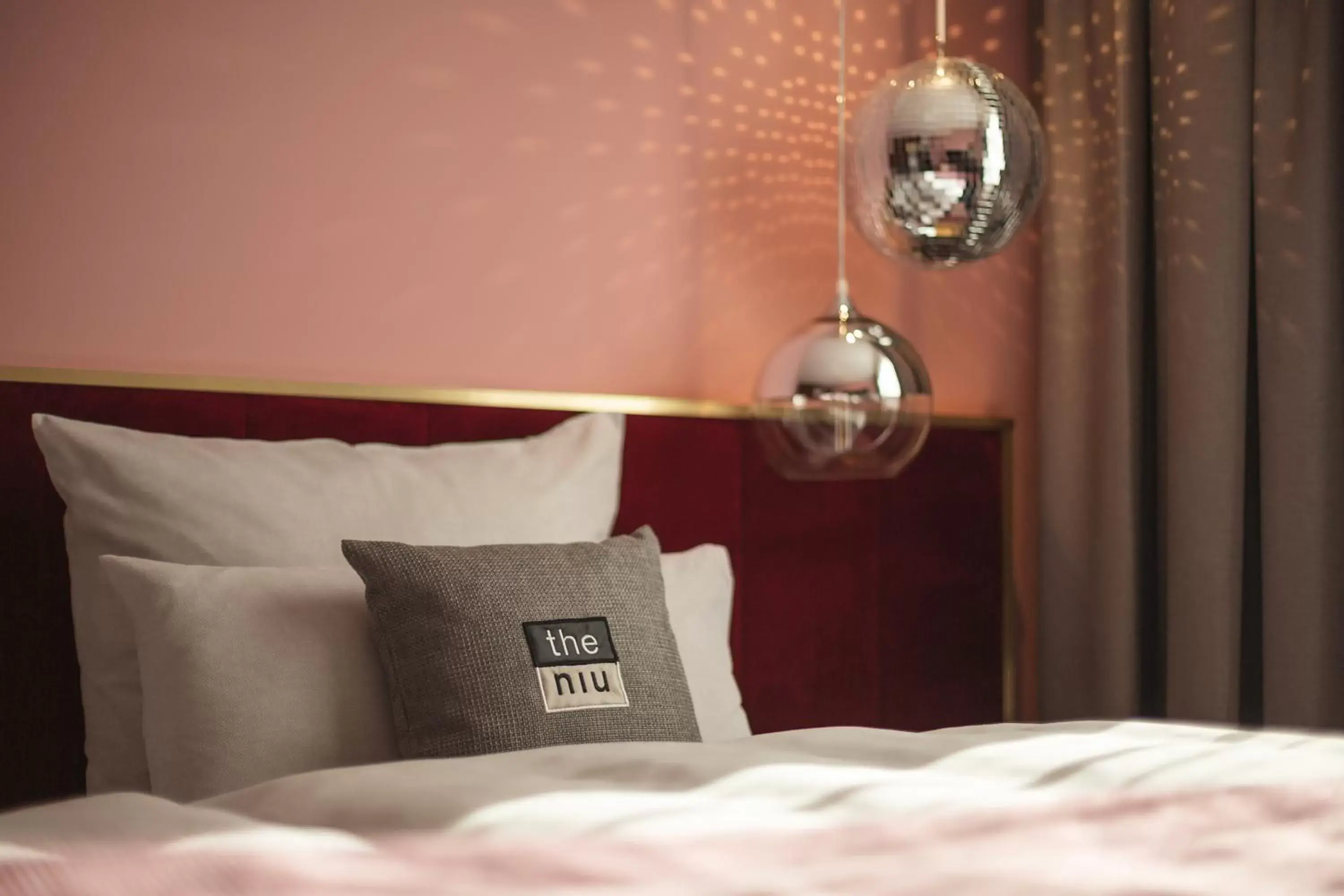 Decorative detail, Bed in Holiday Inn - the niu, Loco Munich North by IHG Decorative detail, Bed in Holiday Inn - the niu, Loco Munich North by IHG