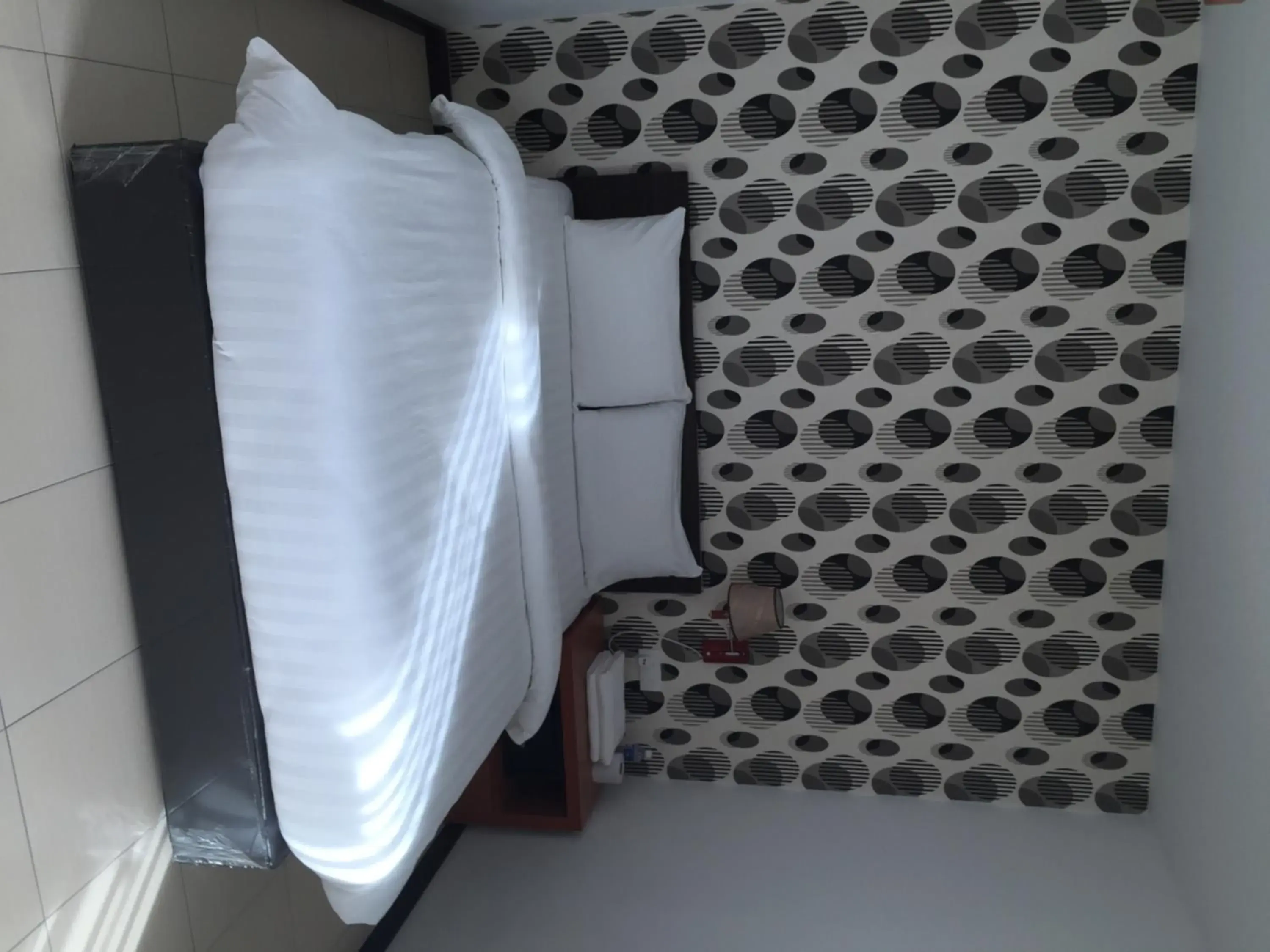 Bed in Permai Hotel