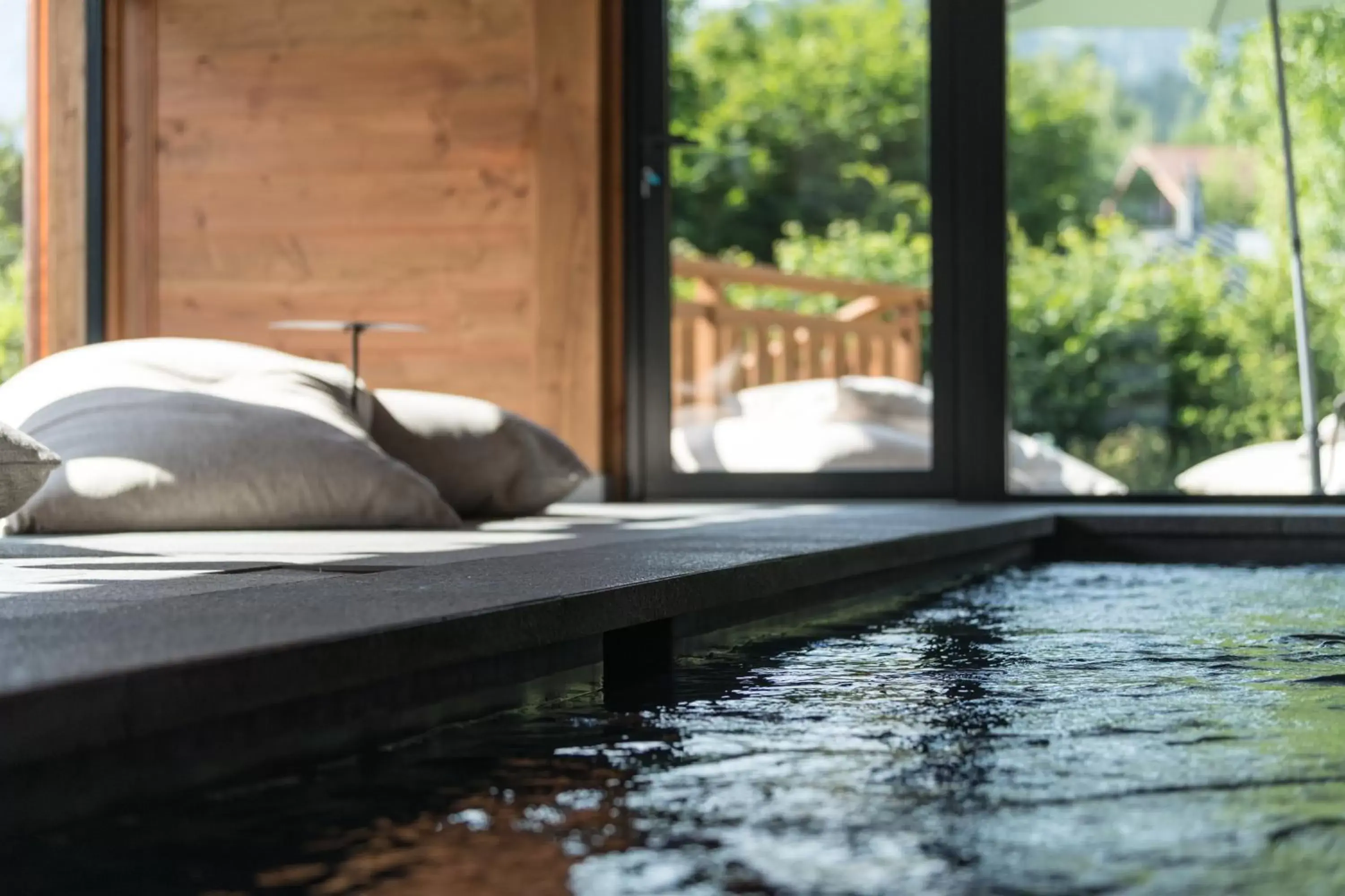 Swimming pool in Hôtel Restaurant La Ferme de Cupelin