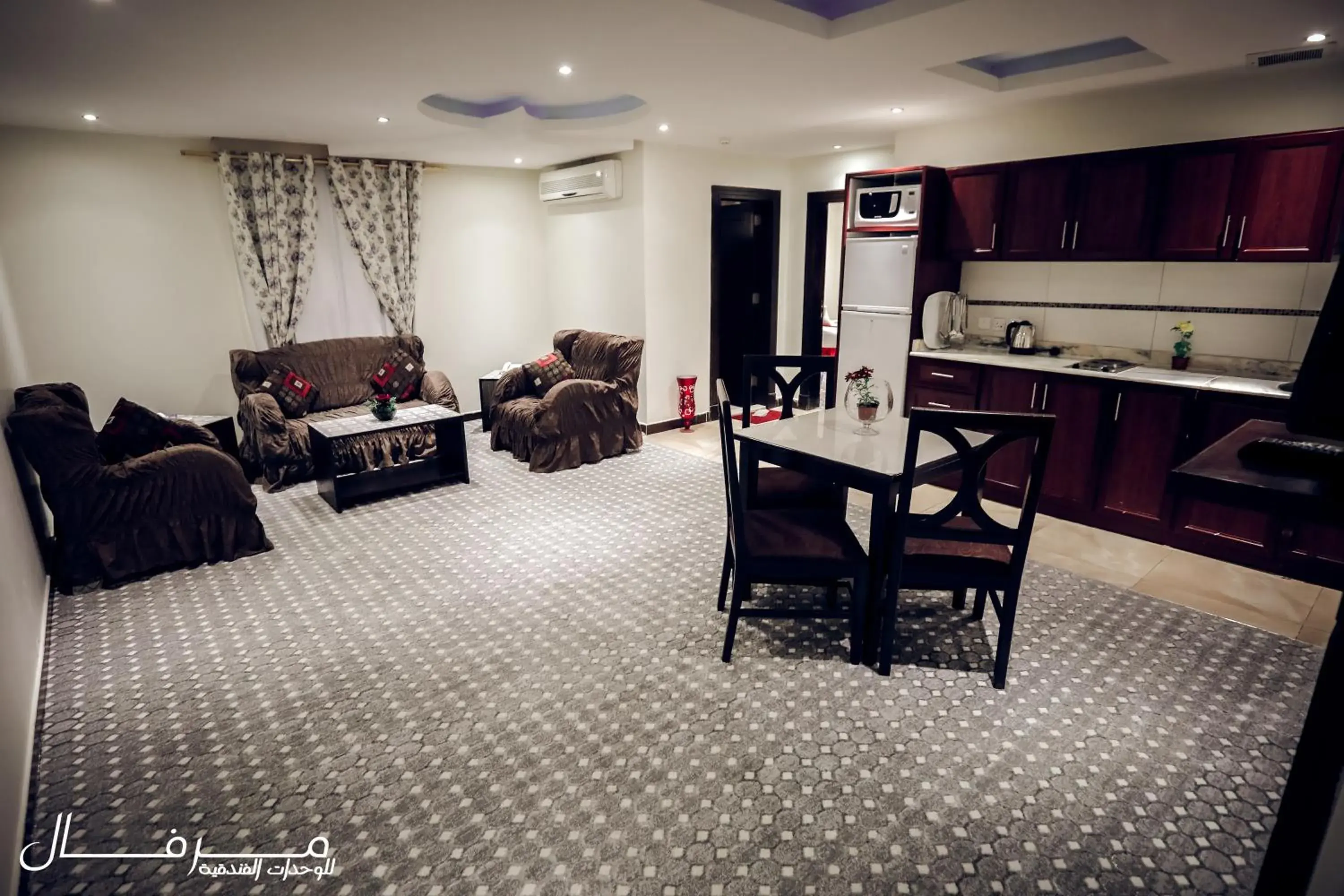 Kitchen or kitchenette, Dining Area in Merfal Hotel Apartments Al Taawan