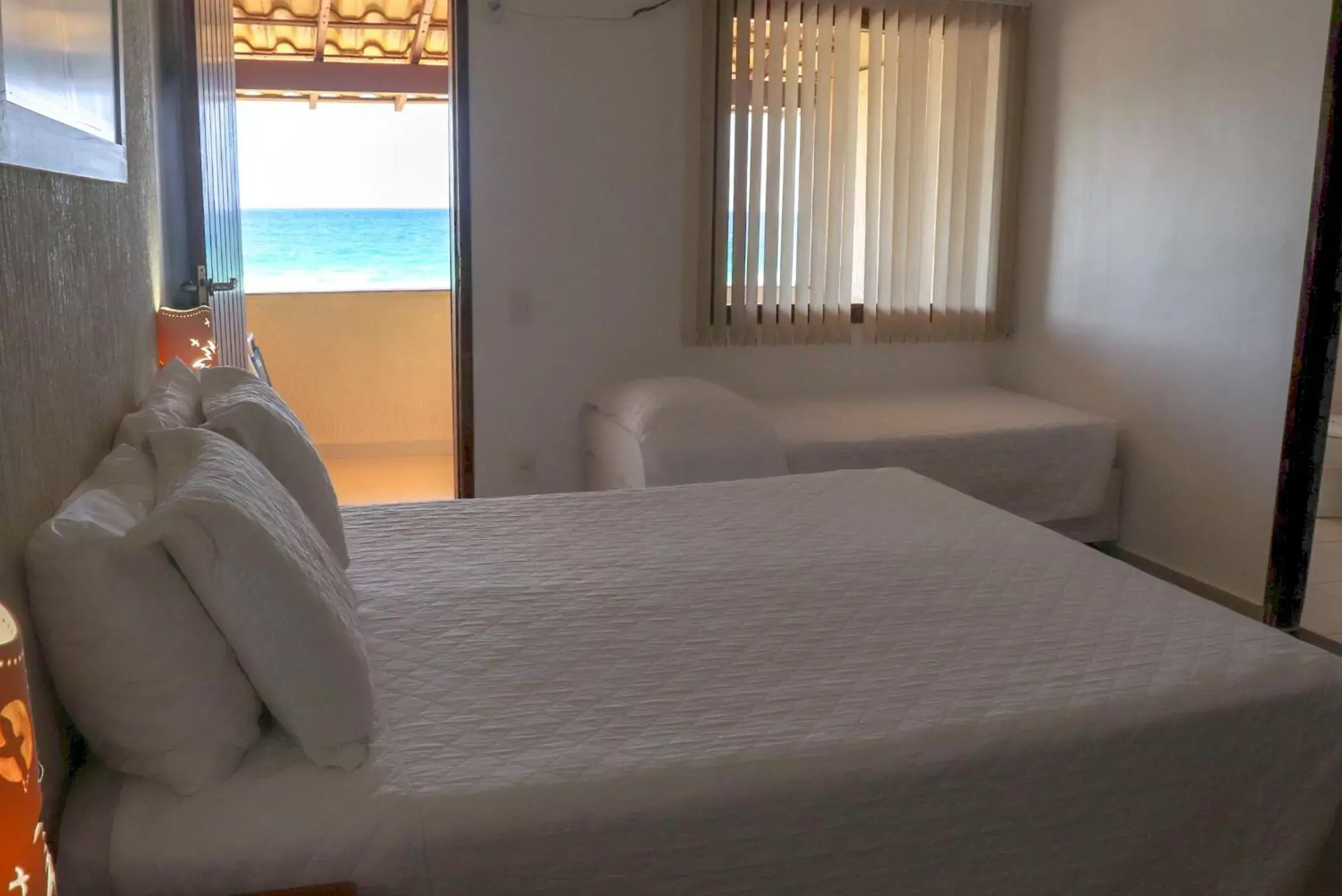 Bed in Pousada do Albatroz