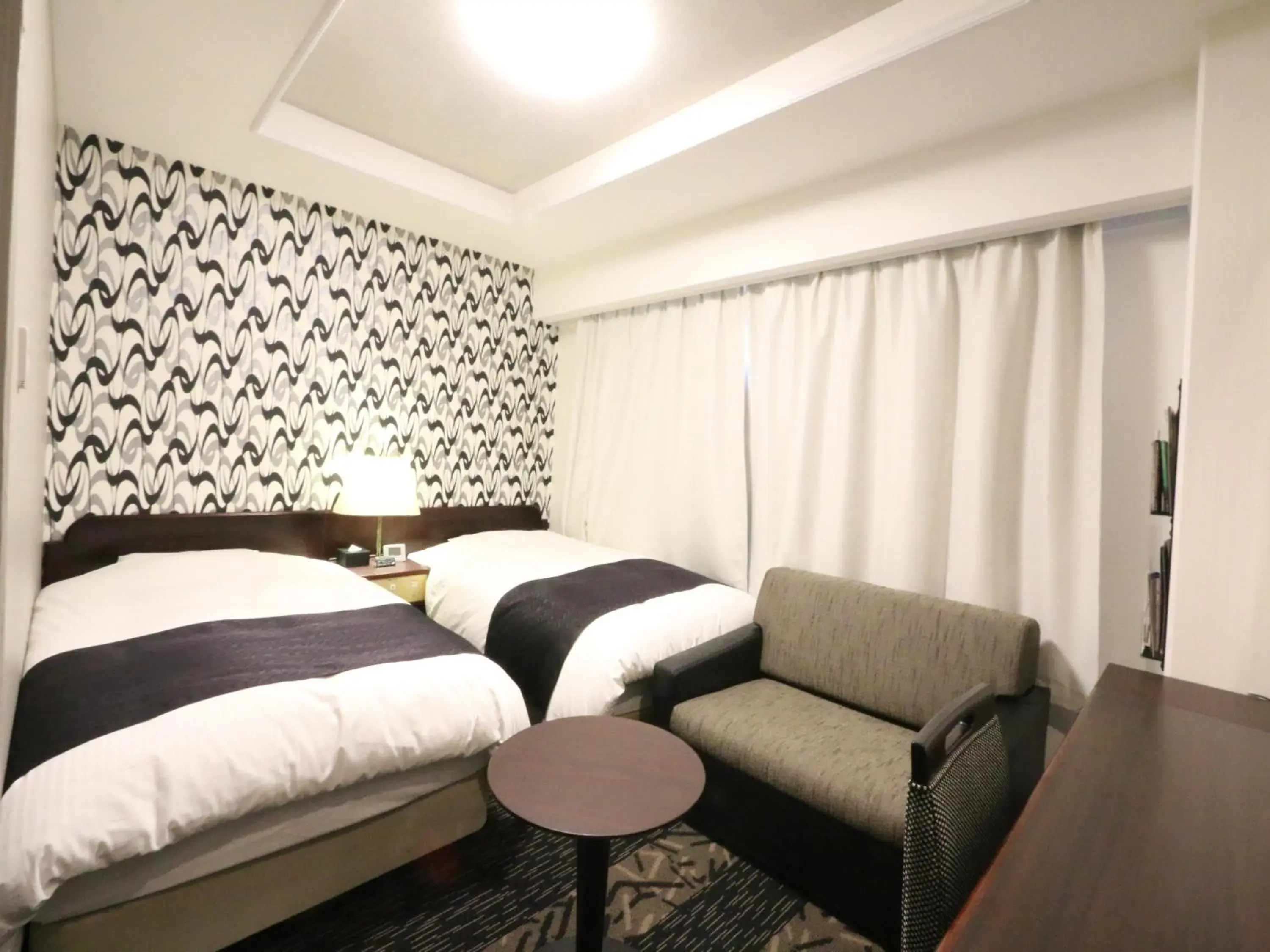 Photo of the whole room, Bed in Apa Hotel Uozu-Ekimae