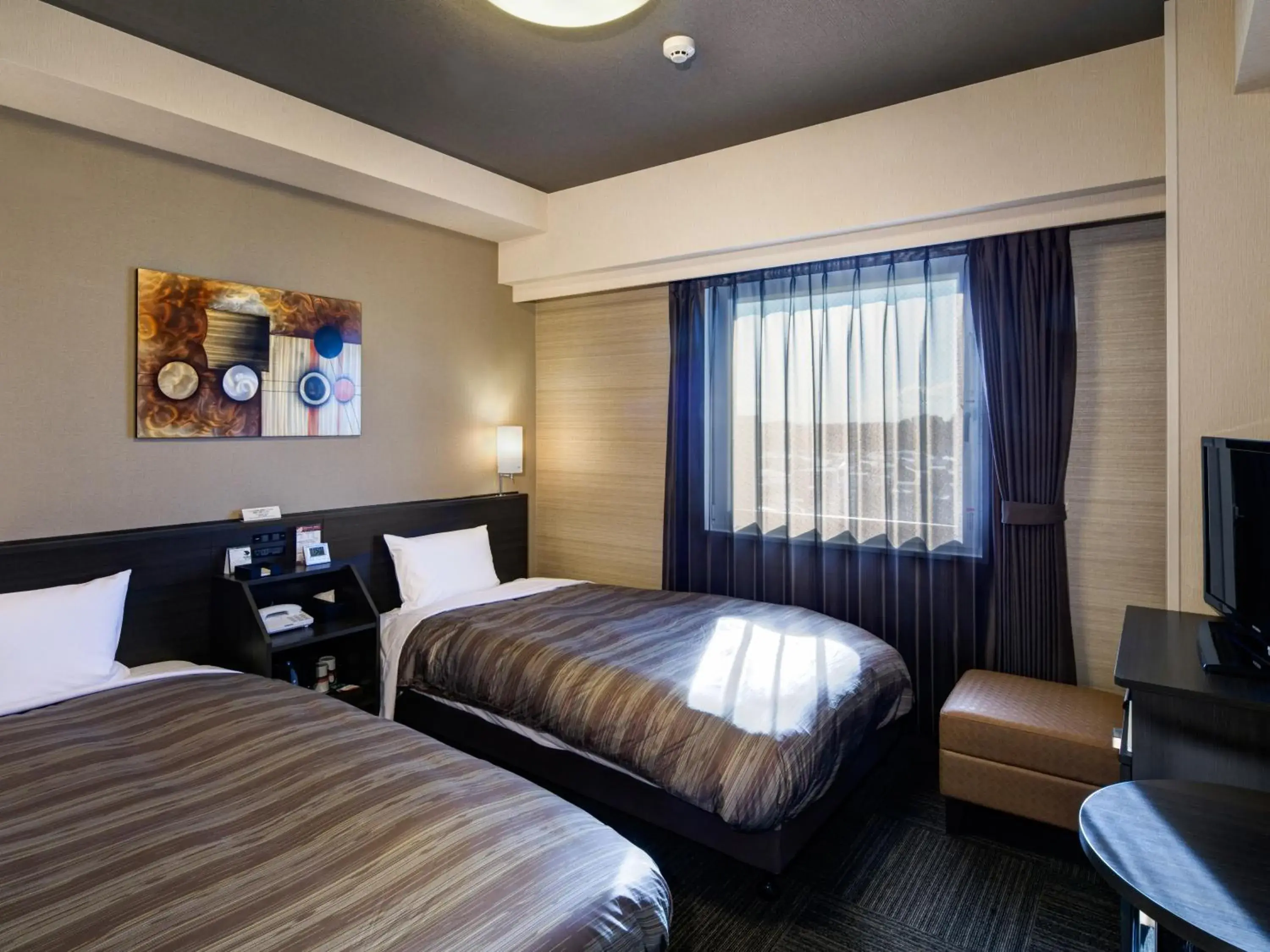 Bed in Hotel Route Inn Sendai Higashi