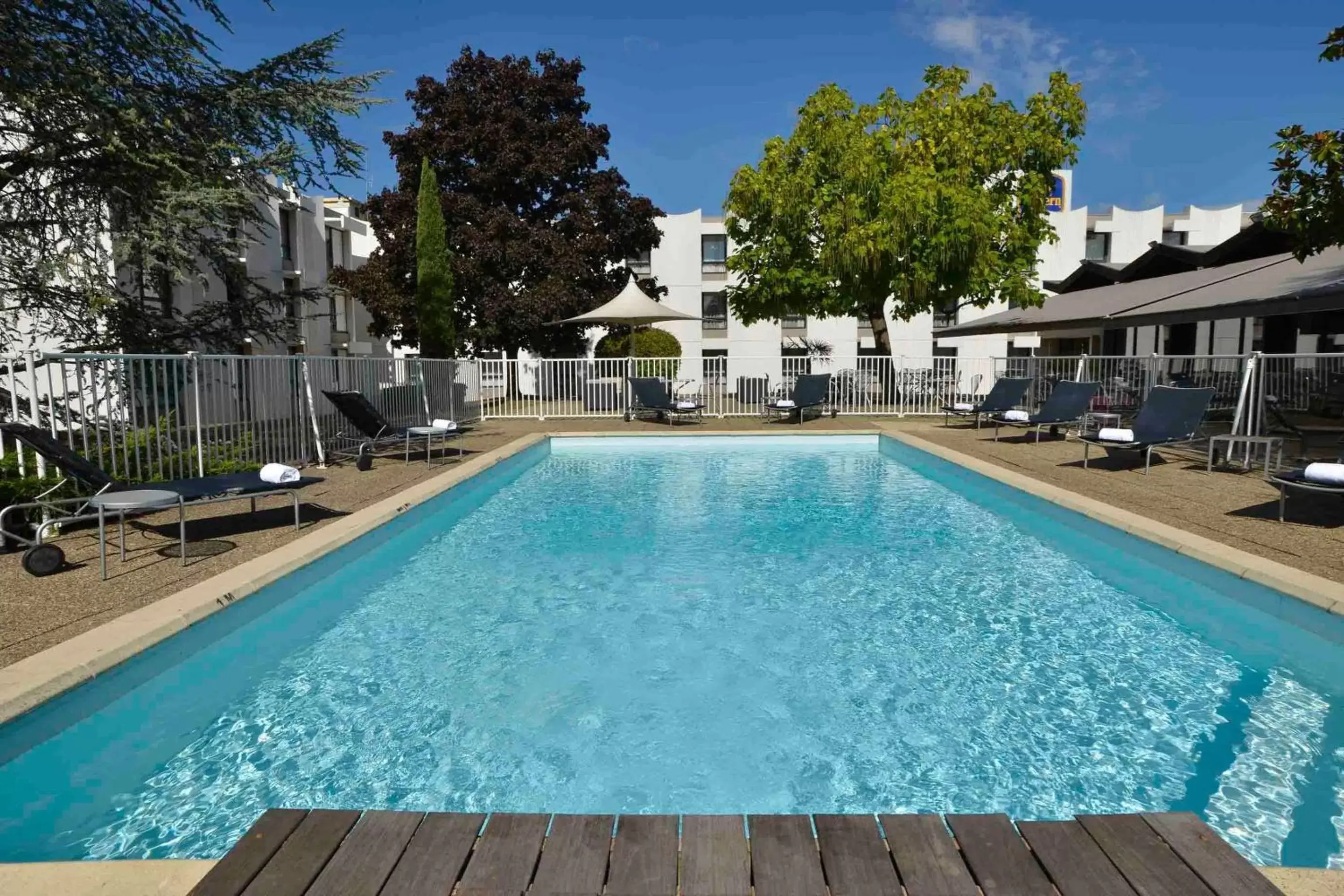 On site, Swimming Pool in Best Western Porte du Forez