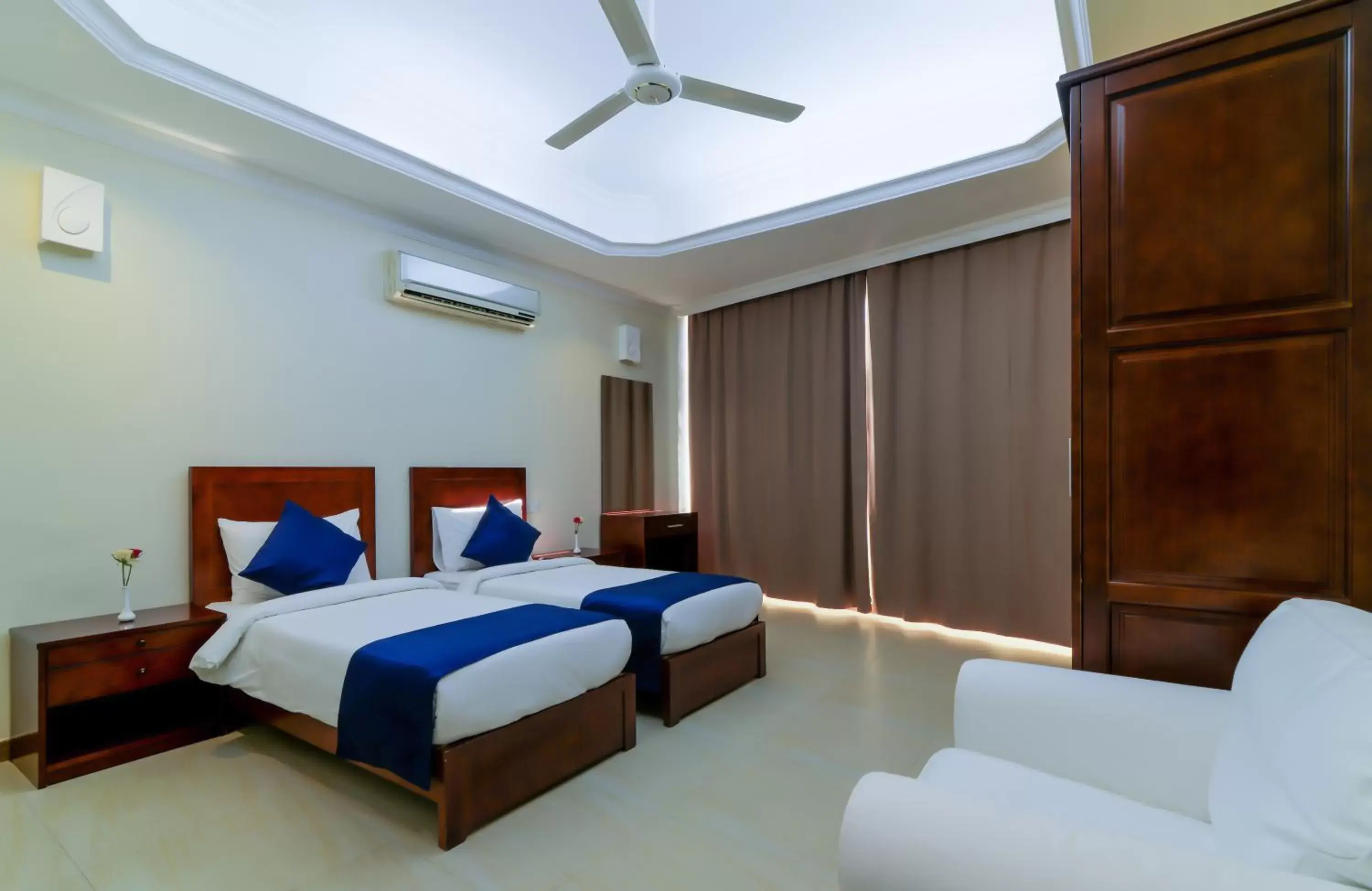Bedroom, Bed in Tanzanite Executive Suites