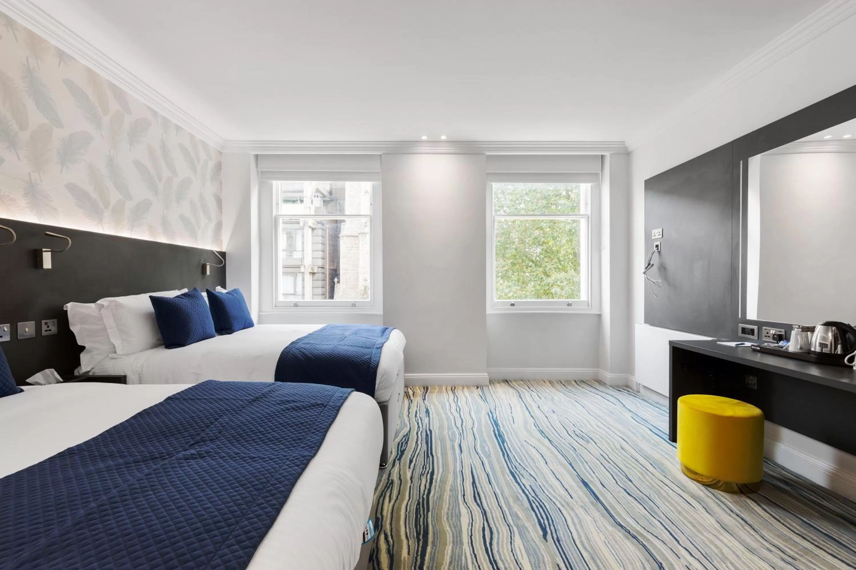 Bed in Commodore Hotel