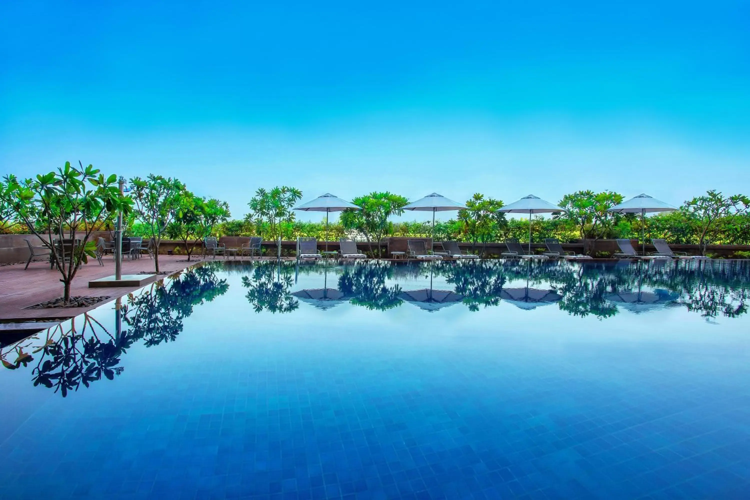 Swimming Pool in Crowne Plaza Ahmedabad City Centre, an IHG Hotel