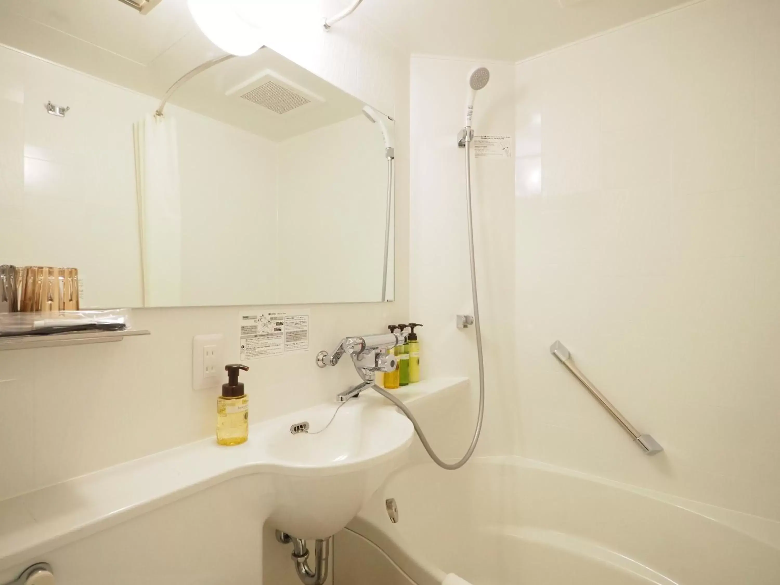 Bathroom in Tabino Hotel lit Matsumoto Milky white Onsen Bathroom in Tabino Hotel lit Matsumoto Milky white Onsen