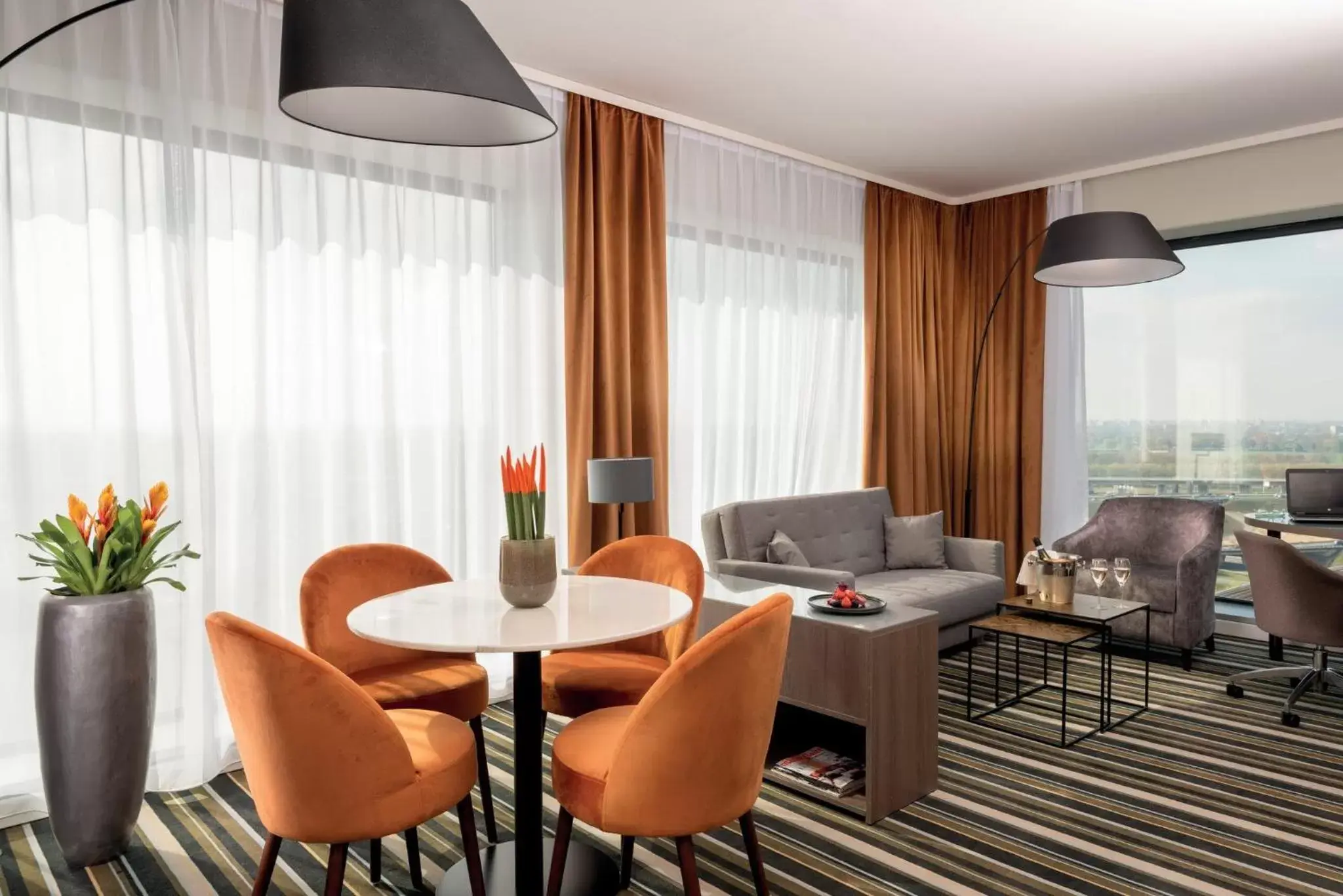 Photo of the whole room, Seating Area in Leonardo Royal Hotel Amsterdam