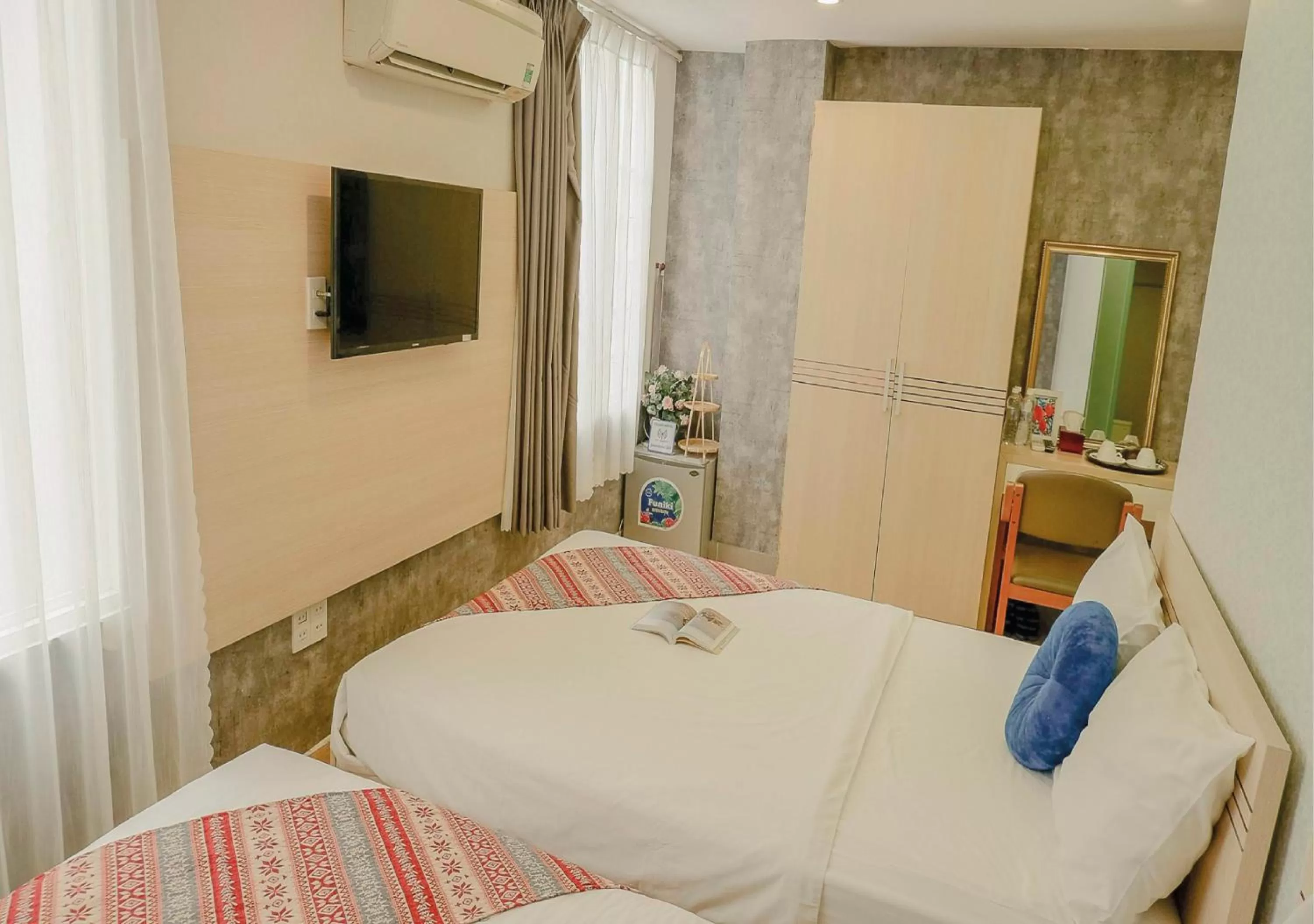 Bed in Galaxy Boutique Sai Gon Central Hotel