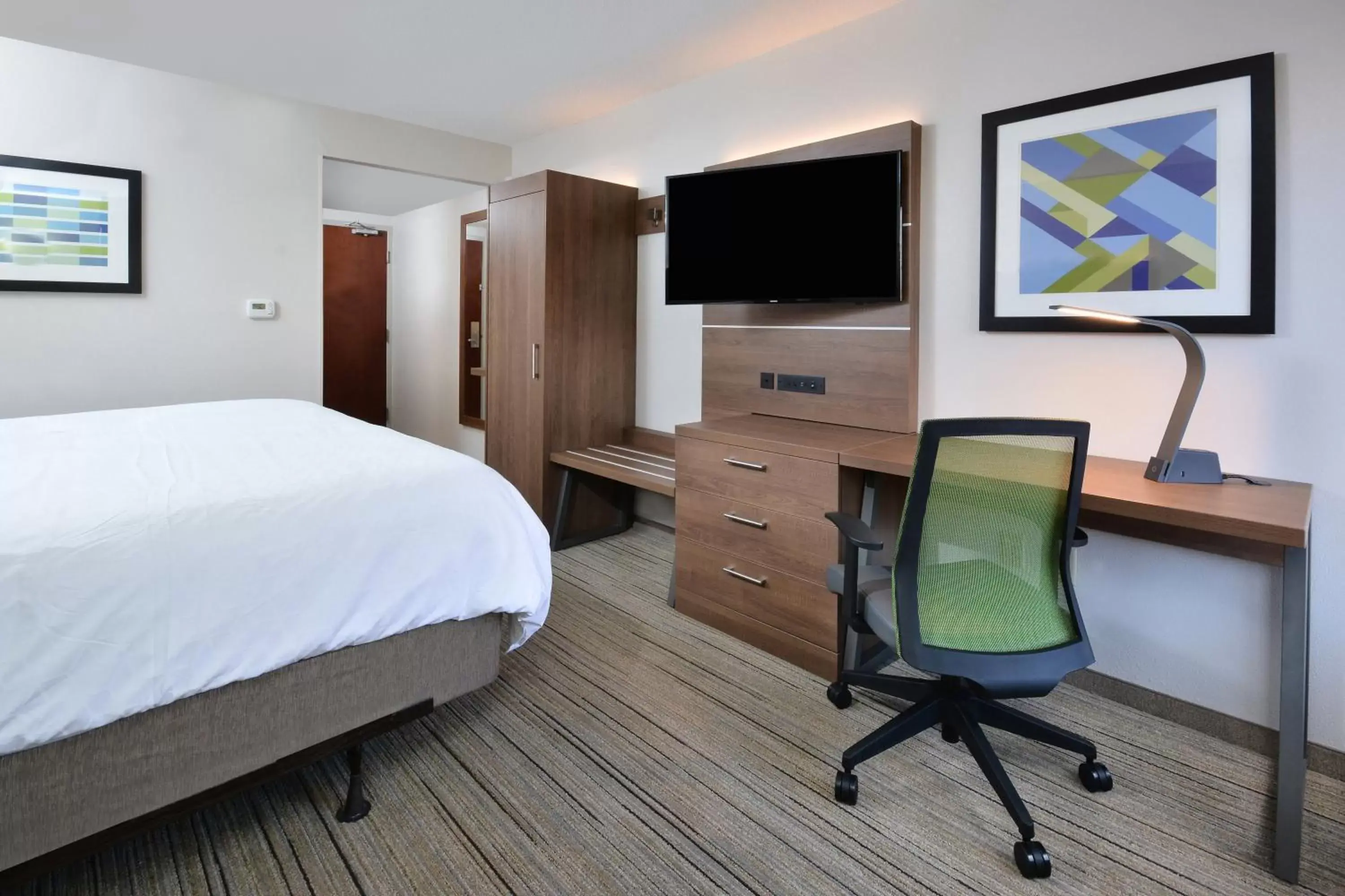 Photo of the whole room, TV/Entertainment Center in Holiday Inn Express Raleigh-Durham Airport, an IHG Hotel