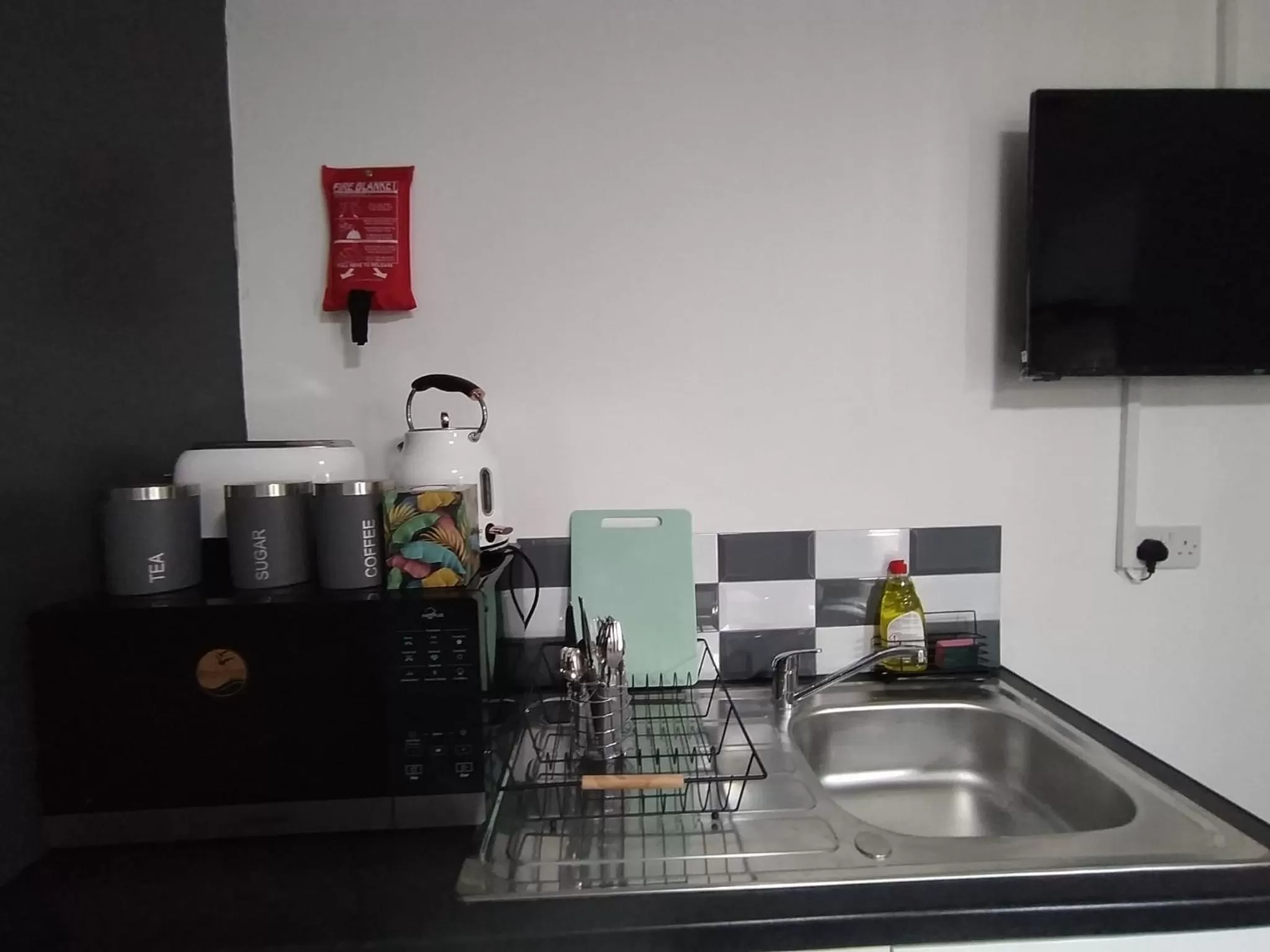 Kitchen or kitchenette in Black Ocean Holiday Apartments