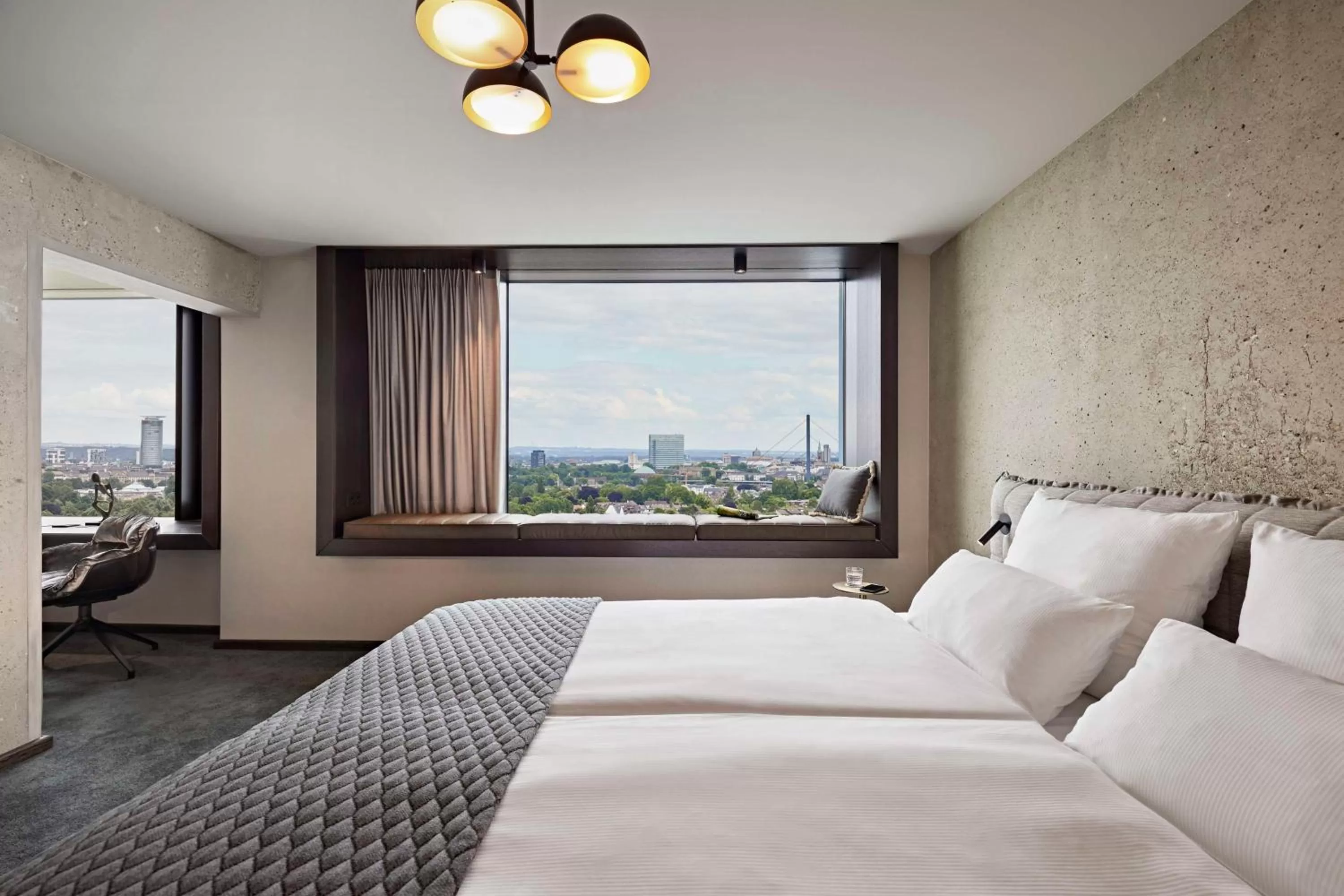 Photo of the whole room, Bed in Lindner Hotel Dusseldorf Seestern, part of JdV by Hyatt