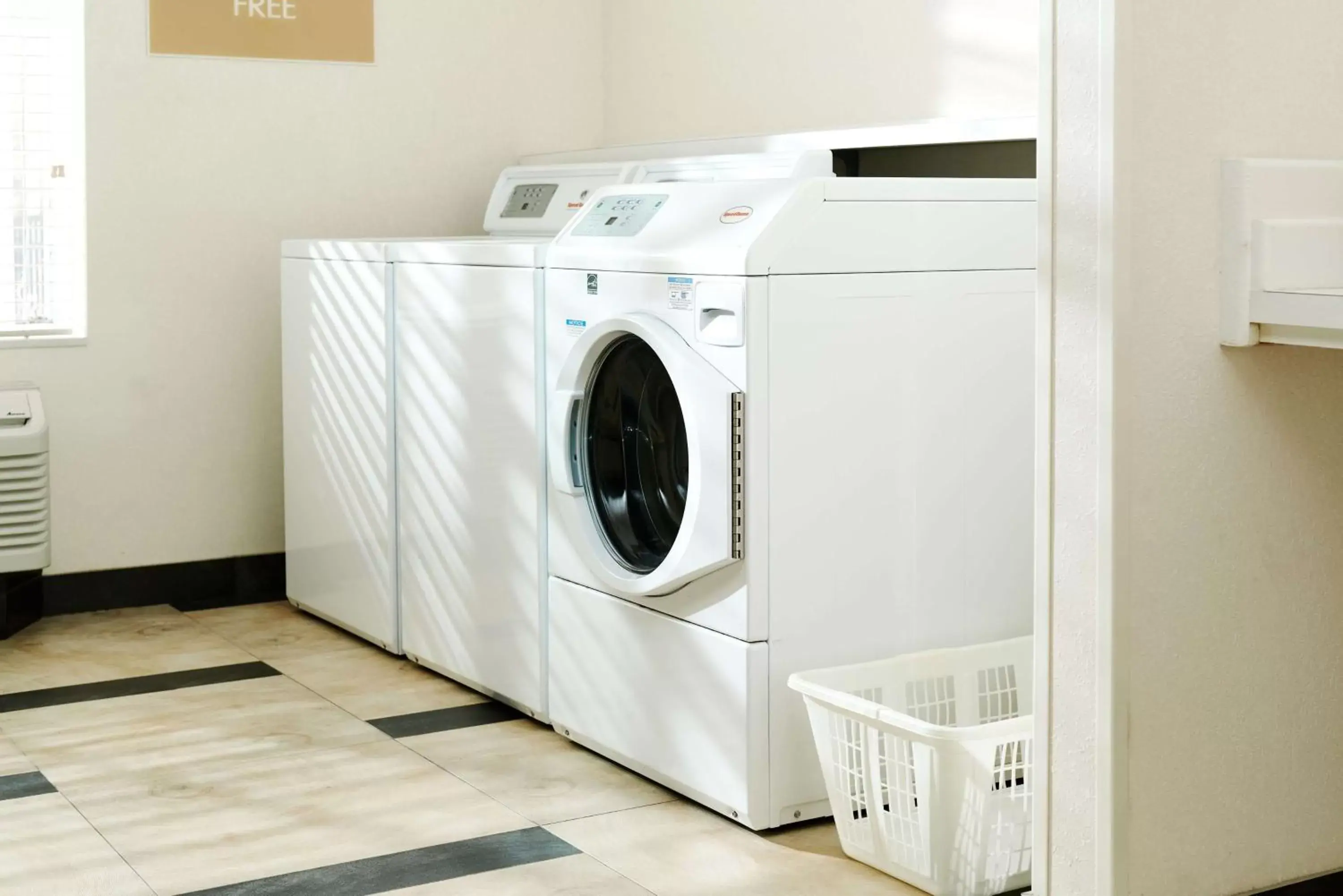 laundry, Kitchen/Kitchenette in Sonesta Simply Suites Houston W Beltway