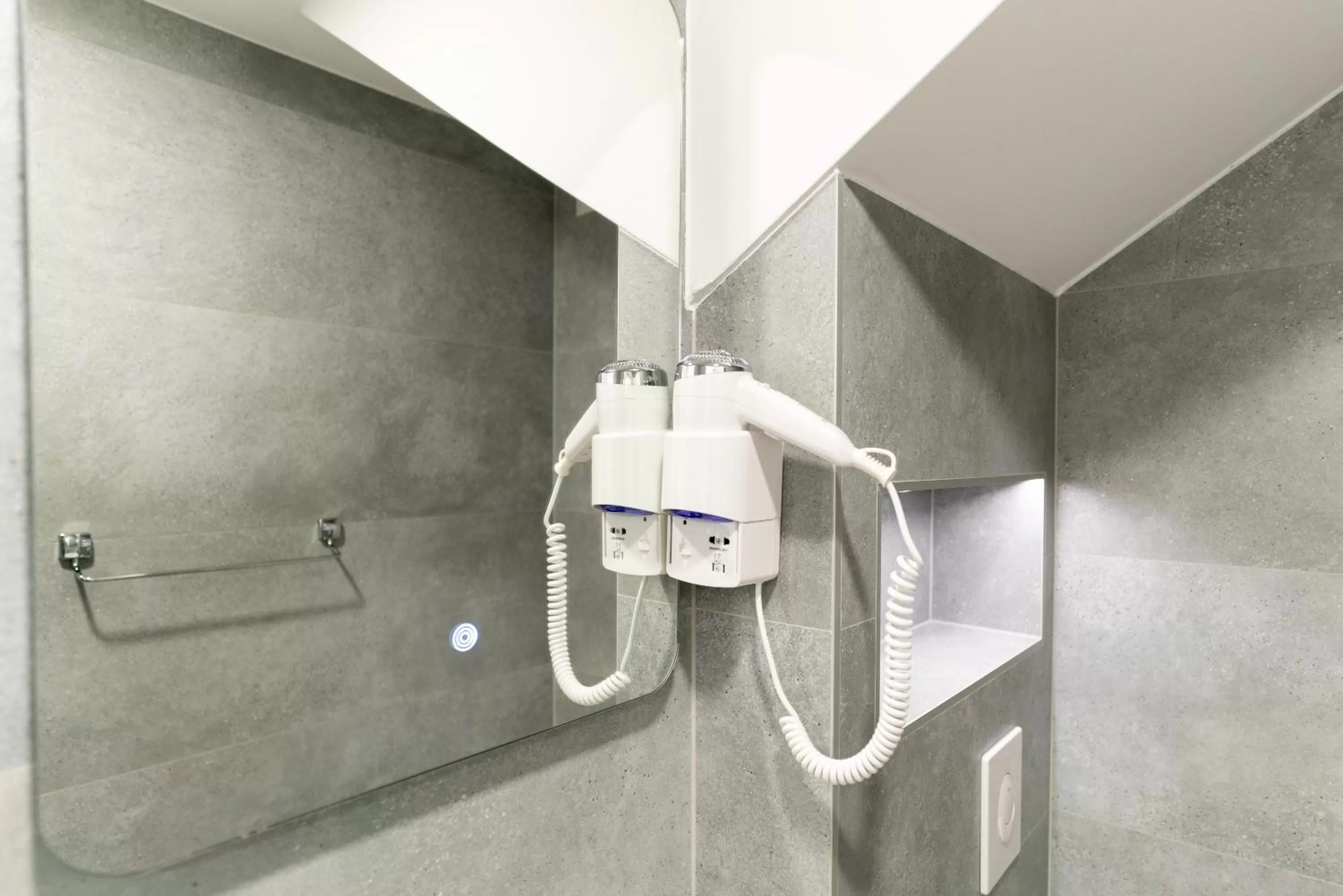 Bathroom in Ornament Hotel and Apartments