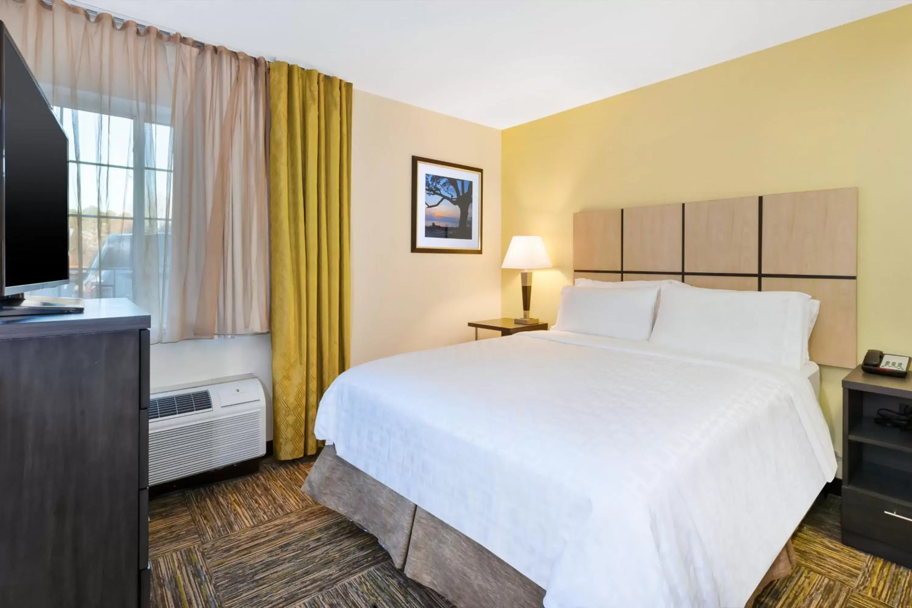 Photo of the whole room, Bed in Candlewood Suites Huntersville-Lake Norman Area, an IHG Hotel