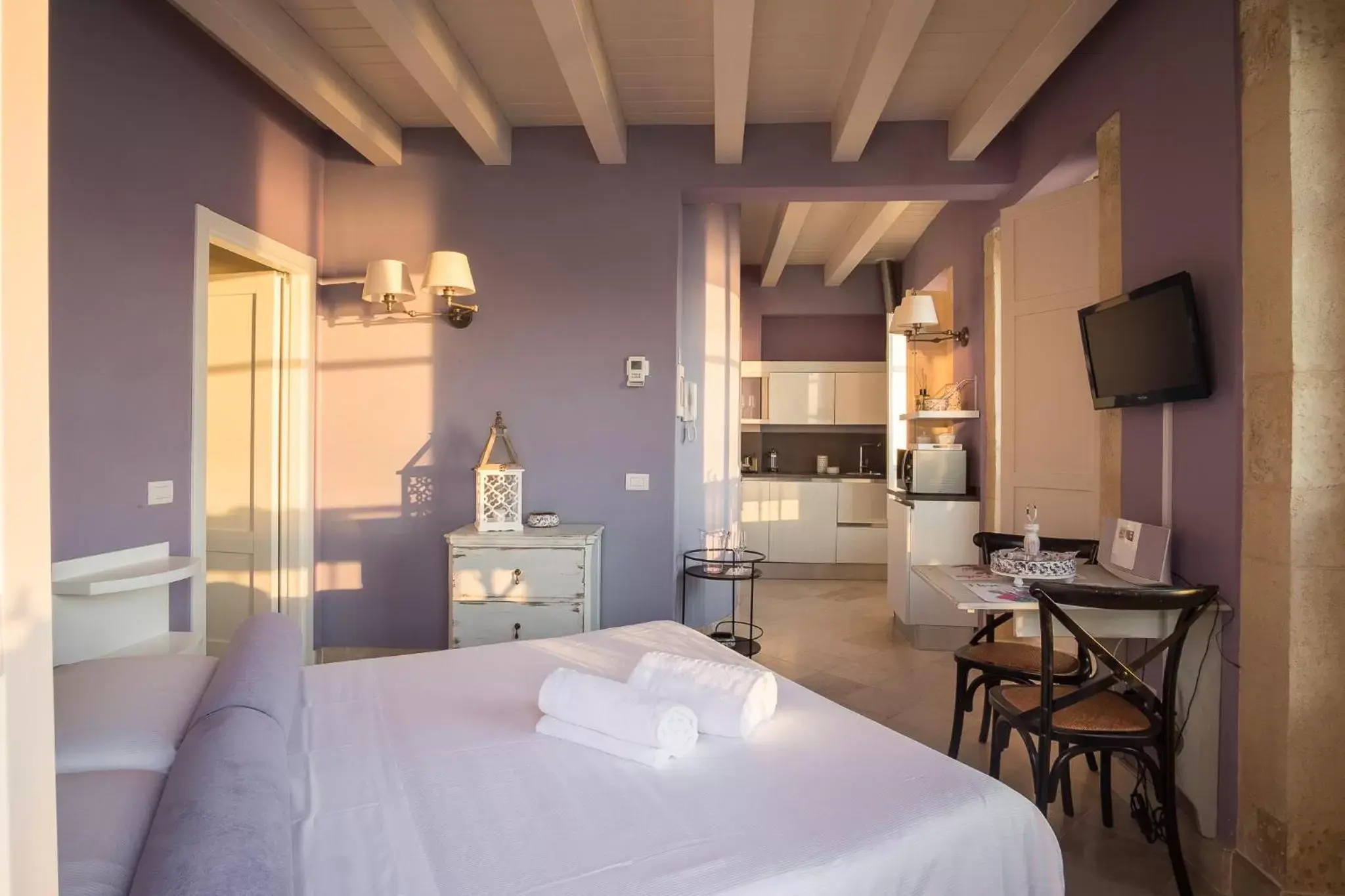 Dining area, Bed in Palazzo Alfeo Aparthotel