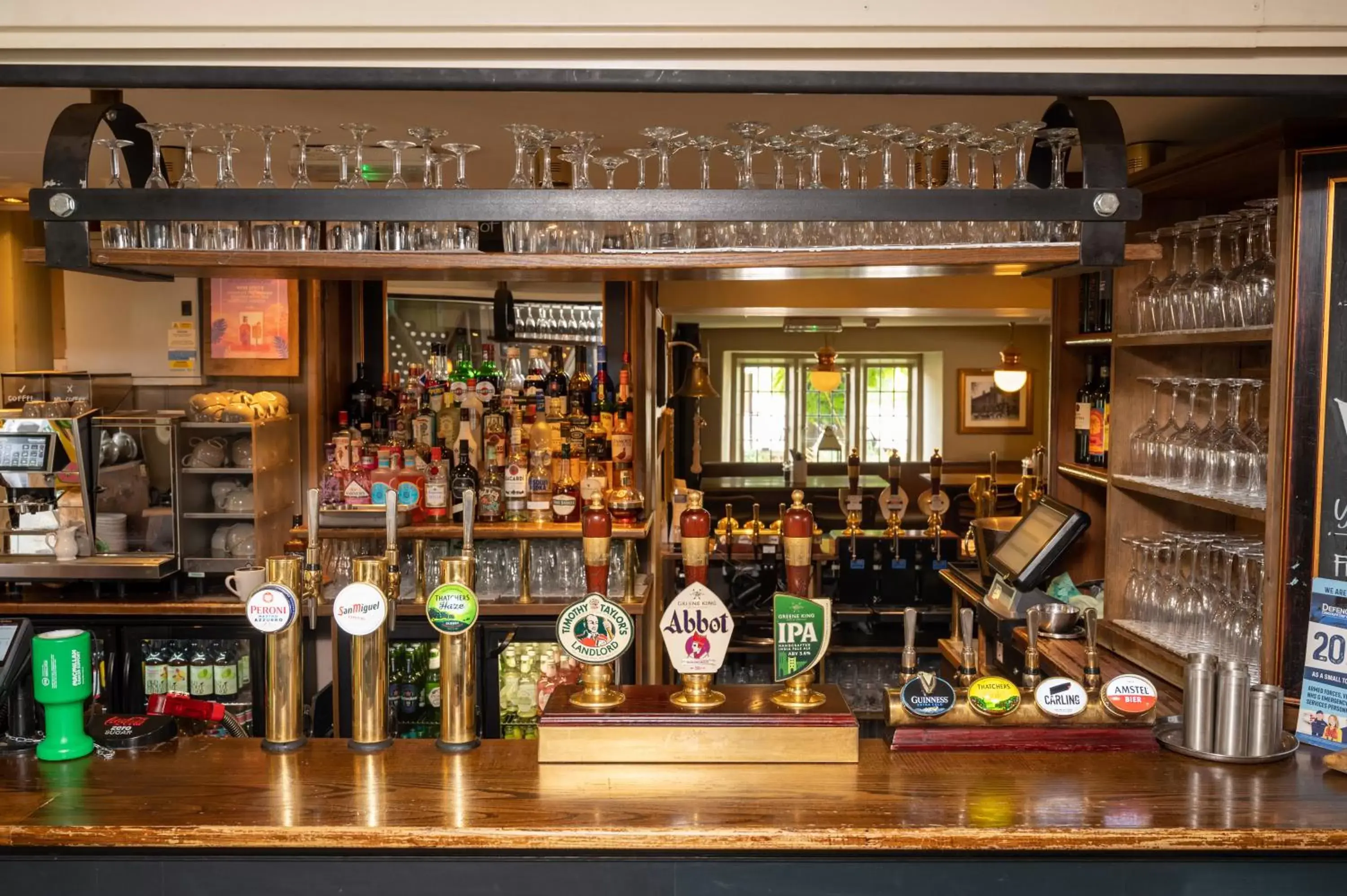 Lounge or bar in Cross Hands Hotel by Greene King Inns