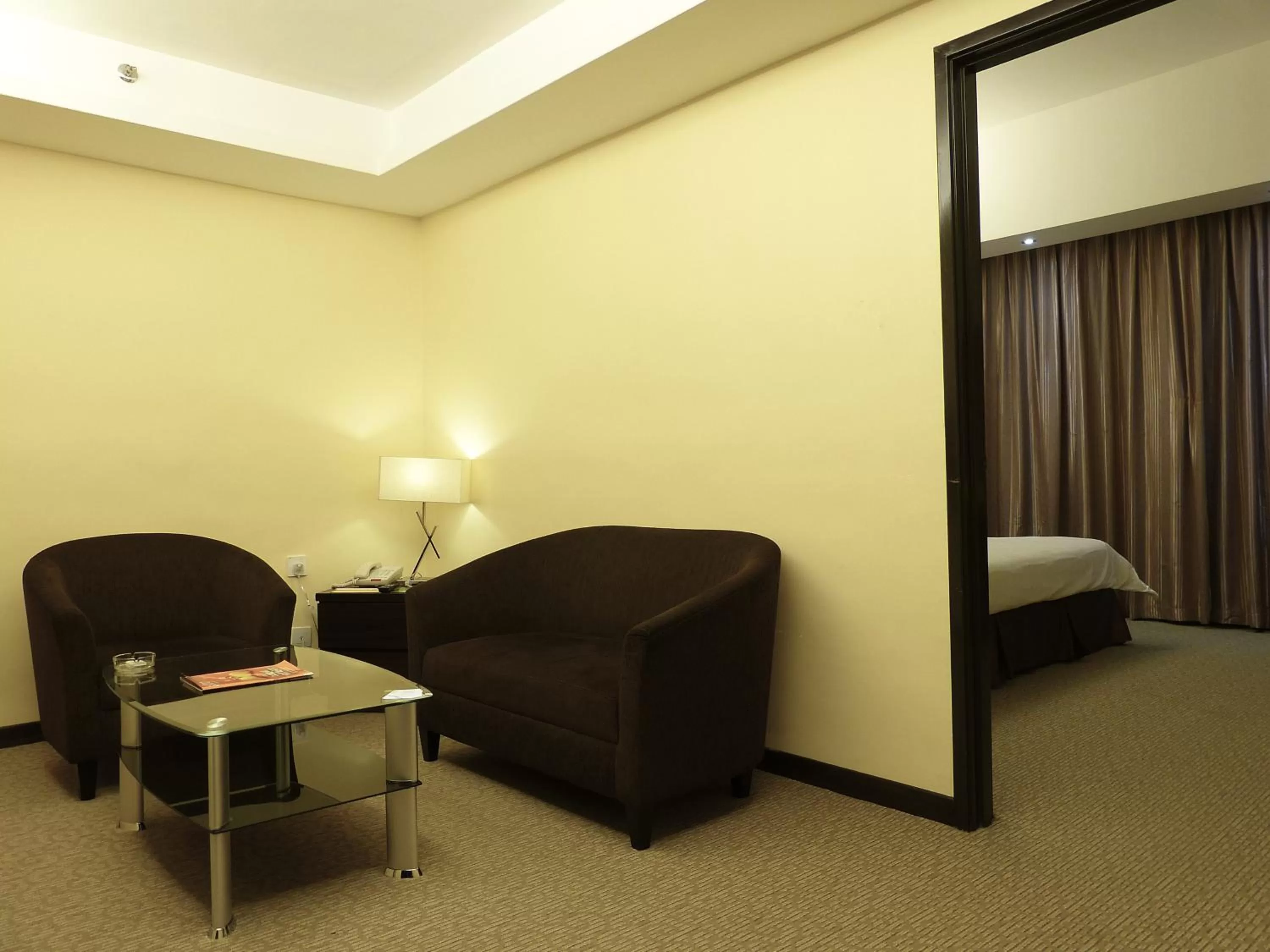 Living room, Bed in Ixora Hotel Penang