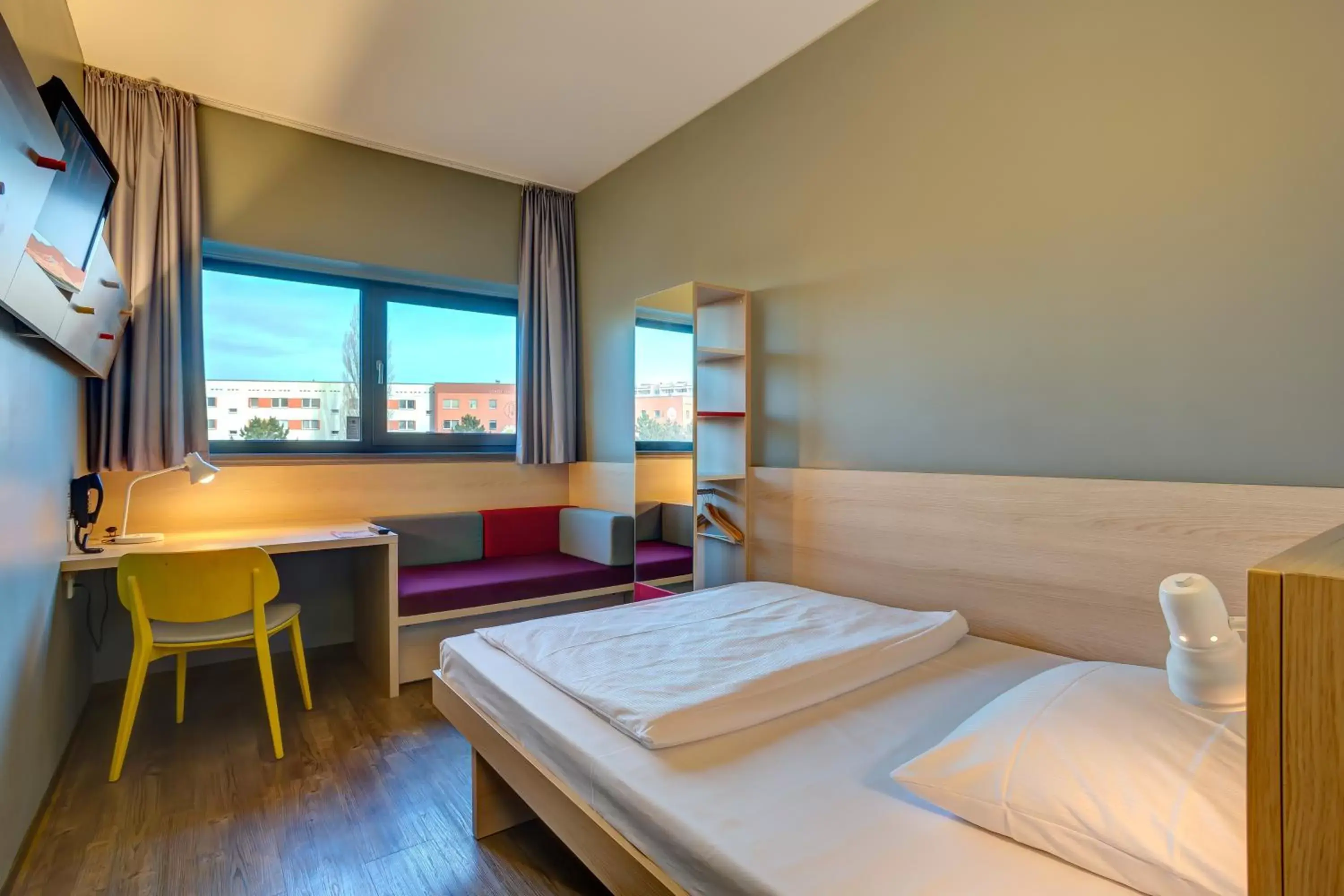 Photo of the whole room, Bed in MEININGER Hotel Berlin Airport