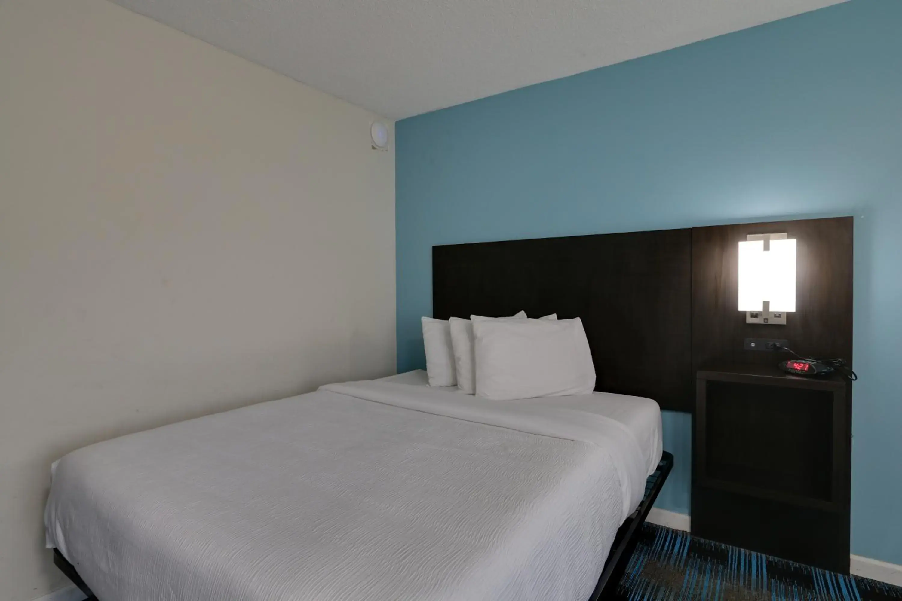 Bed in Travelodge by Wyndham Calhoun South I-75