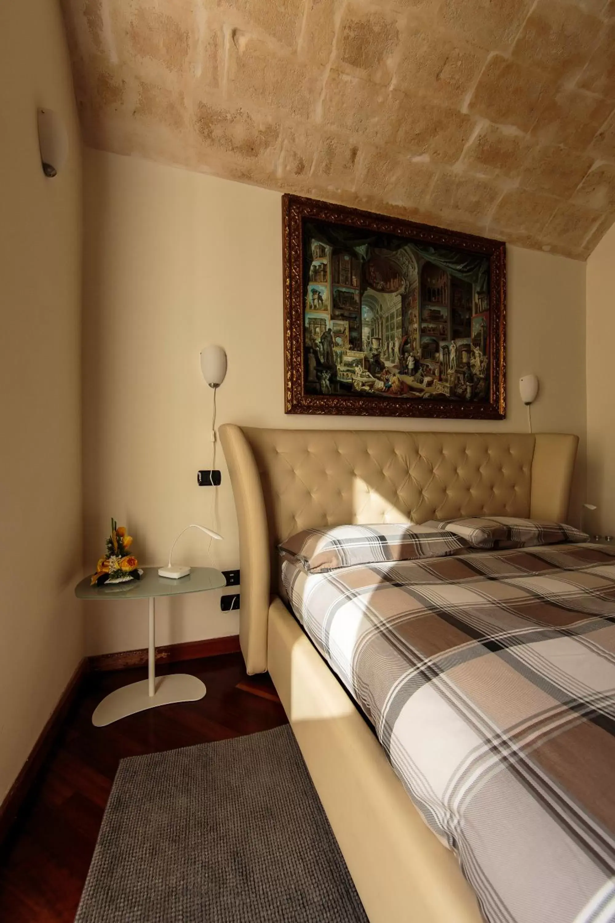 Bed in Alla dimora di Chiara Suite and Rooms